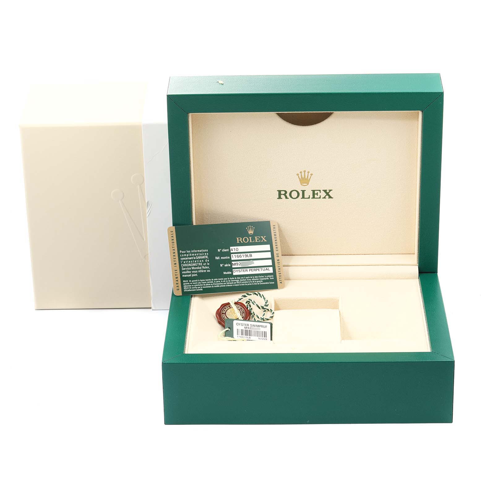 The image shows a Rolex Submariner 116619 Men's White Gold Blue Dial 116619 Men's White Gold Blue Dial watch box, open, with the warranty card and tags inside.