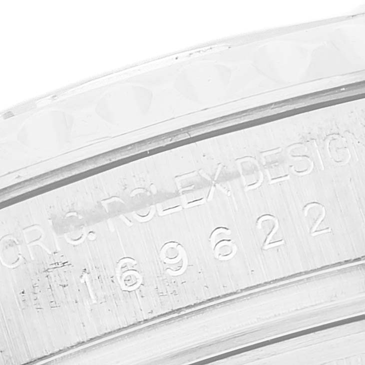 This image shows a close-up angle of the Rolex Yacht-Master 169622 Women's Stainless Steel Silver Dial 169622 Women's Stainless Steel Silver Dial model's case back engraving.