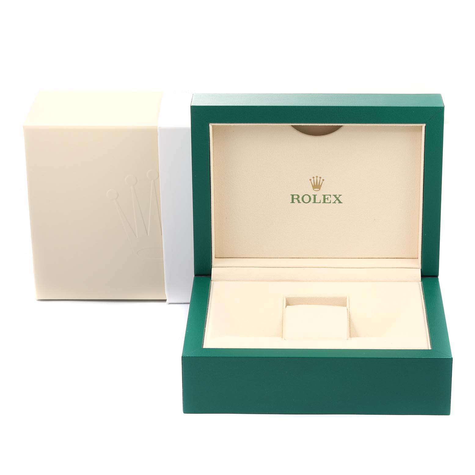 The image shows an open Rolex Yacht-Master 116680 Men
s Stainless Steel White Dial 116680 Men
s Stainless Steel White Dial watch box with a green exterior and beige interior.