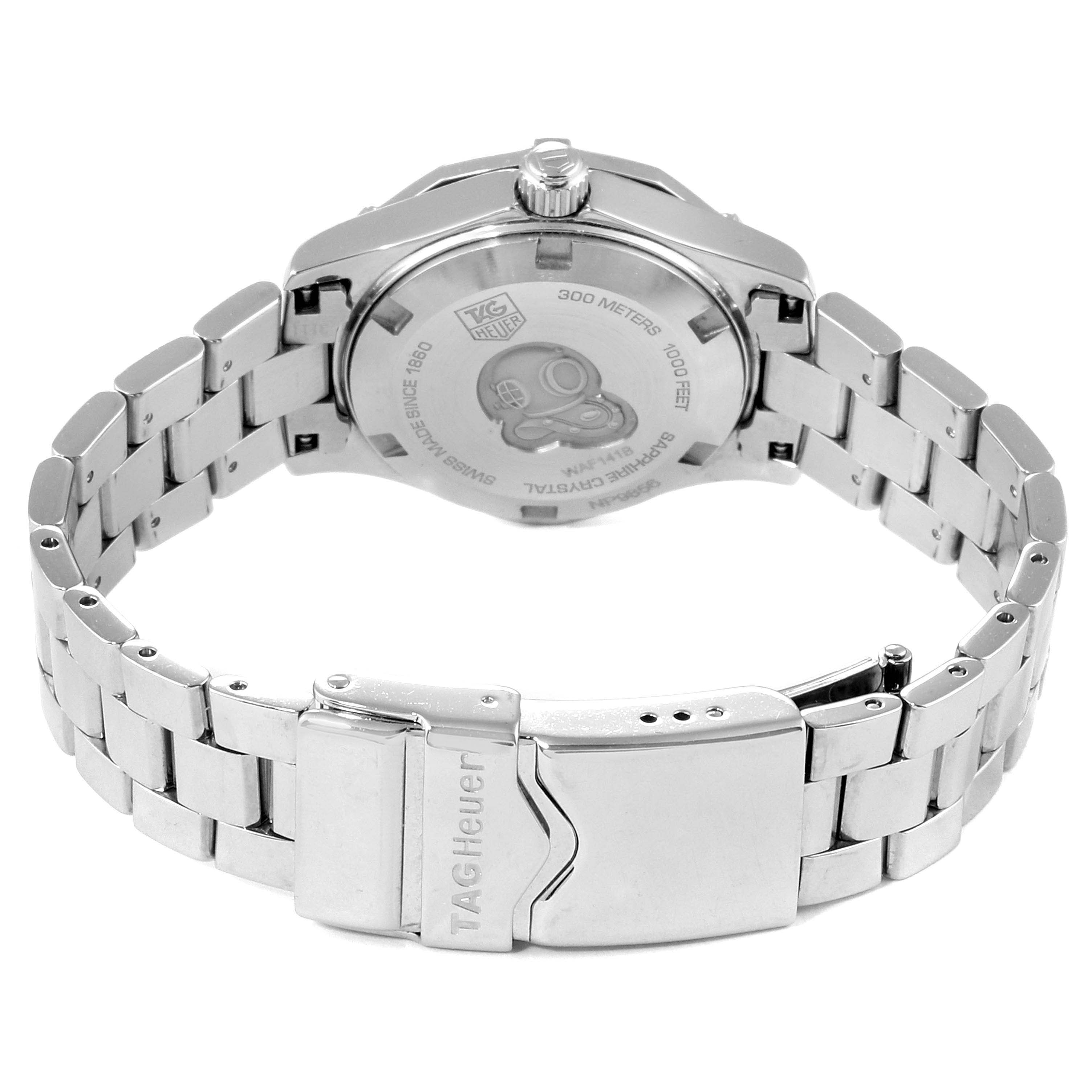 The image shows the back and clasp of a Tag Heuer Aquaracer WAF141B.BA0824 Women's Stainless Steel Mother of Pearl Dial WAF141B.BA0824 Women's Stainless Steel Mother of Pearl Dial watch from a rear angle.