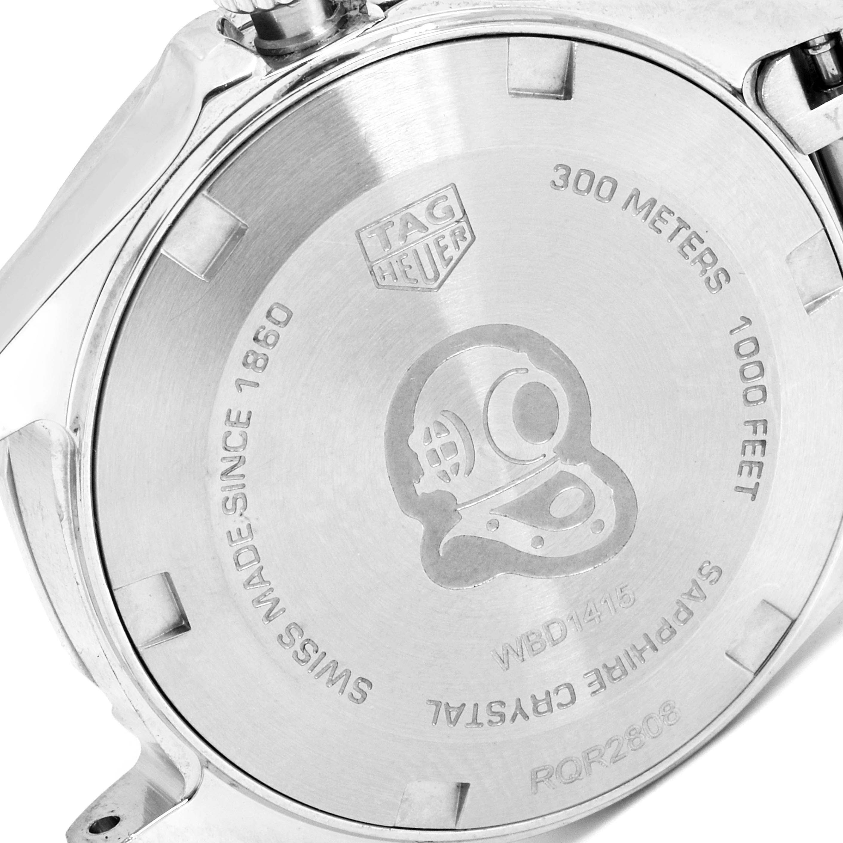 The image shows the back casing of a Tag Heuer Aquaracer WBD1415.BA0741 Women's Stainless Steel Mother of Pearl Dial WBD1415.BA0741 Women's Stainless Steel Mother of Pearl Dial watch with engravings including water resistance and brand details.