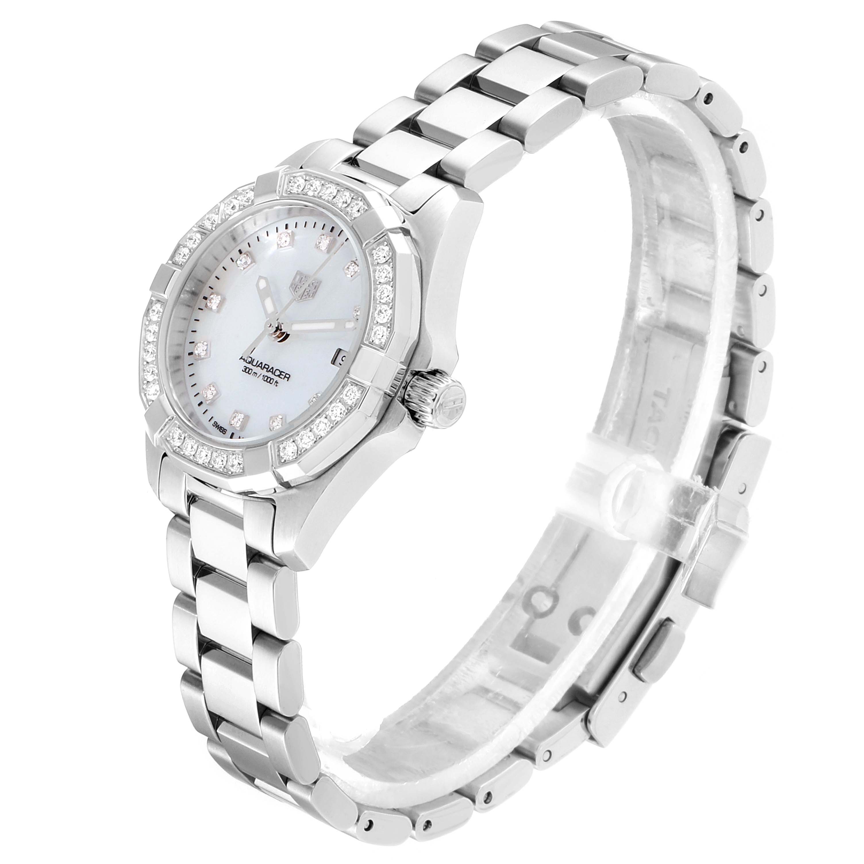 The image shows a side angle of the Tag Heuer Aquaracer WBD1415.BA0741 Women's Stainless Steel Mother of Pearl Dial WBD1415.BA0741 Women's Stainless Steel Mother of Pearl Dial watch, showcasing its face, bezel, case, and band.