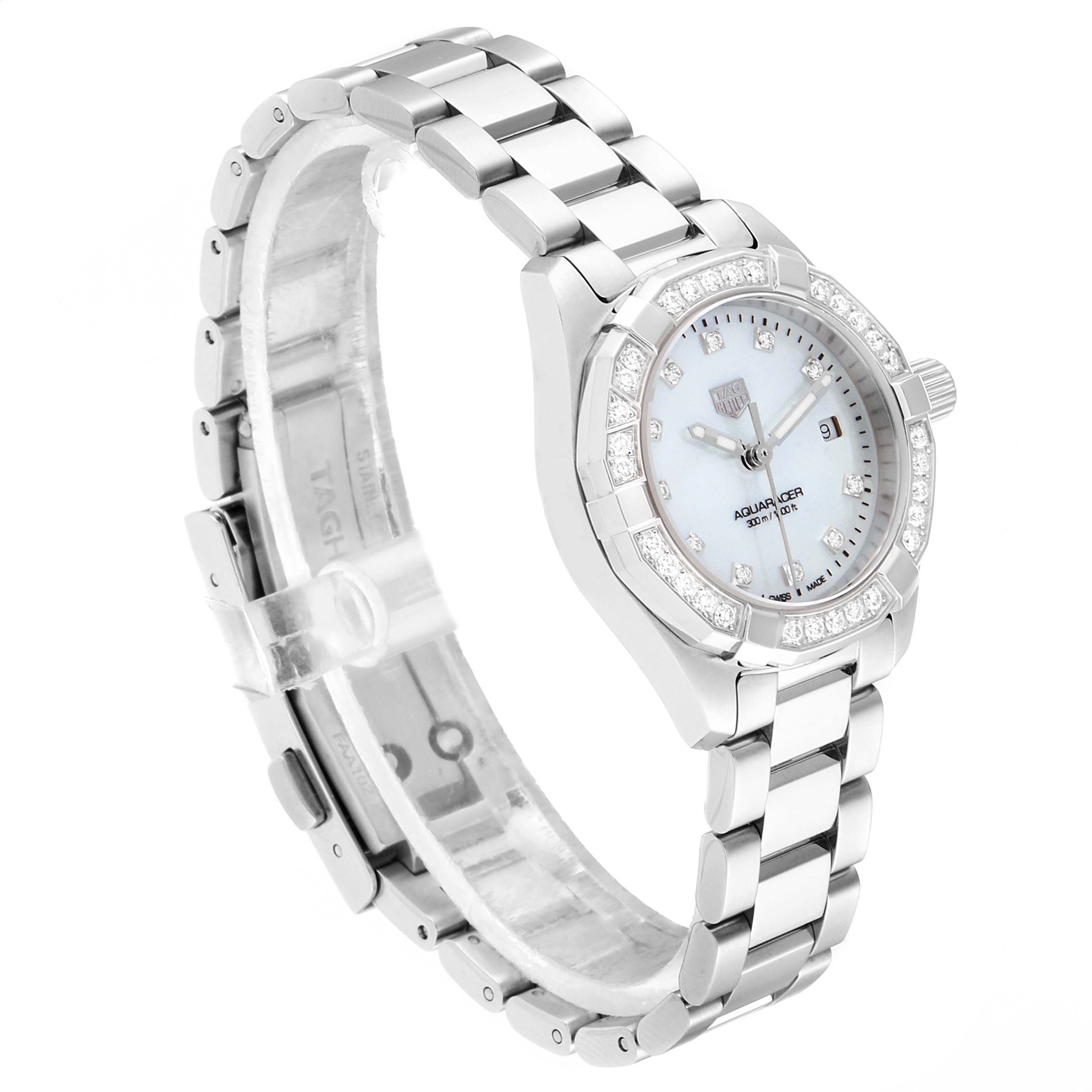 The image shows a side-angle view of the Tag Heuer Aquaracer WBD1415.BA0741 Women's Stainless Steel Mother of Pearl Dial WBD1415.BA0741 Women's Stainless Steel Mother of Pearl Dial watch, highlighting its bracelet, bezel, and dial.