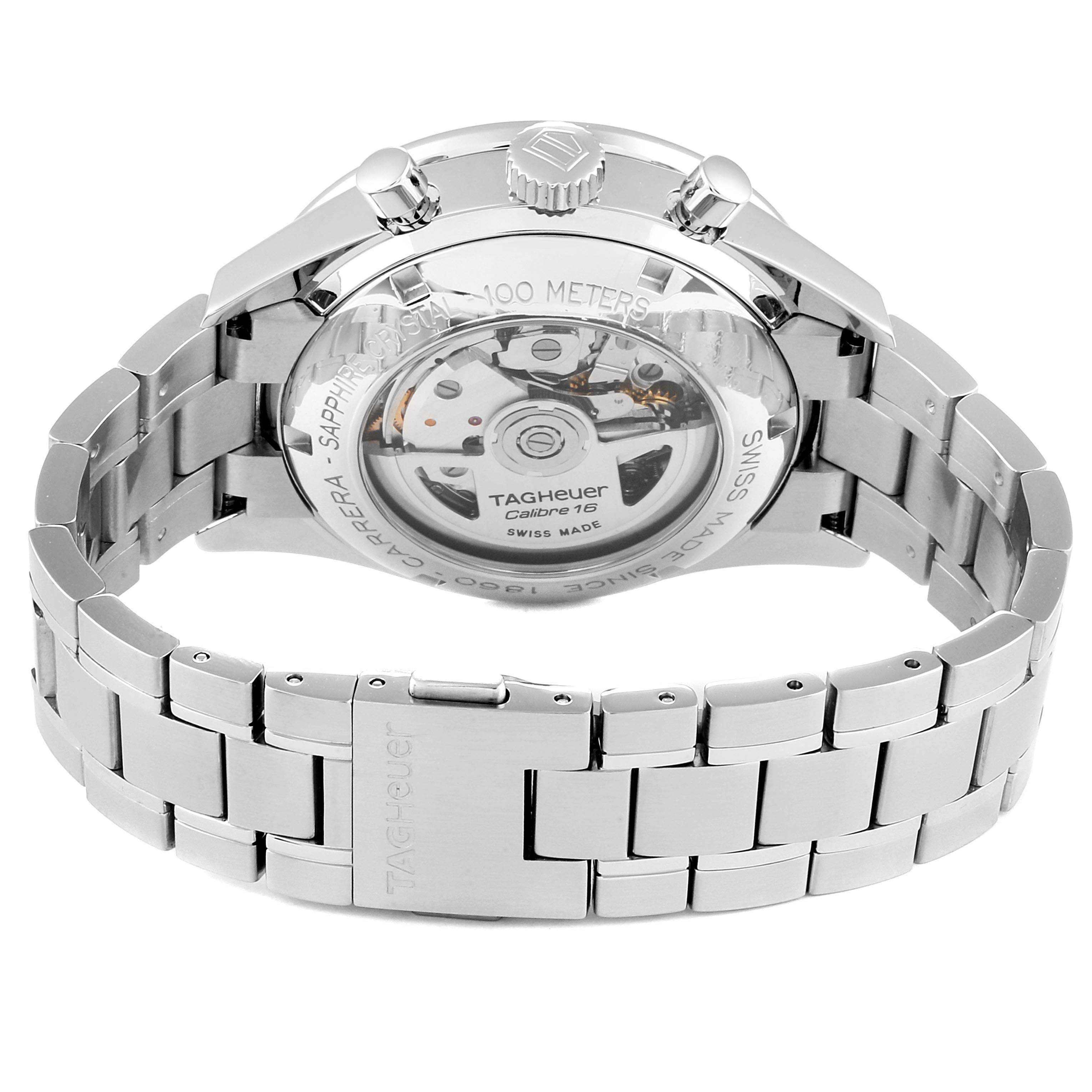 The image shows the back view of a Tag Heuer Carrera CV2A1V.BA0738 Men
s Stainless Steel Blue Dial CV2A1V.BA0738 Men
s Stainless Steel Blue Dial watch, revealing its transparent case and metal bracelet.