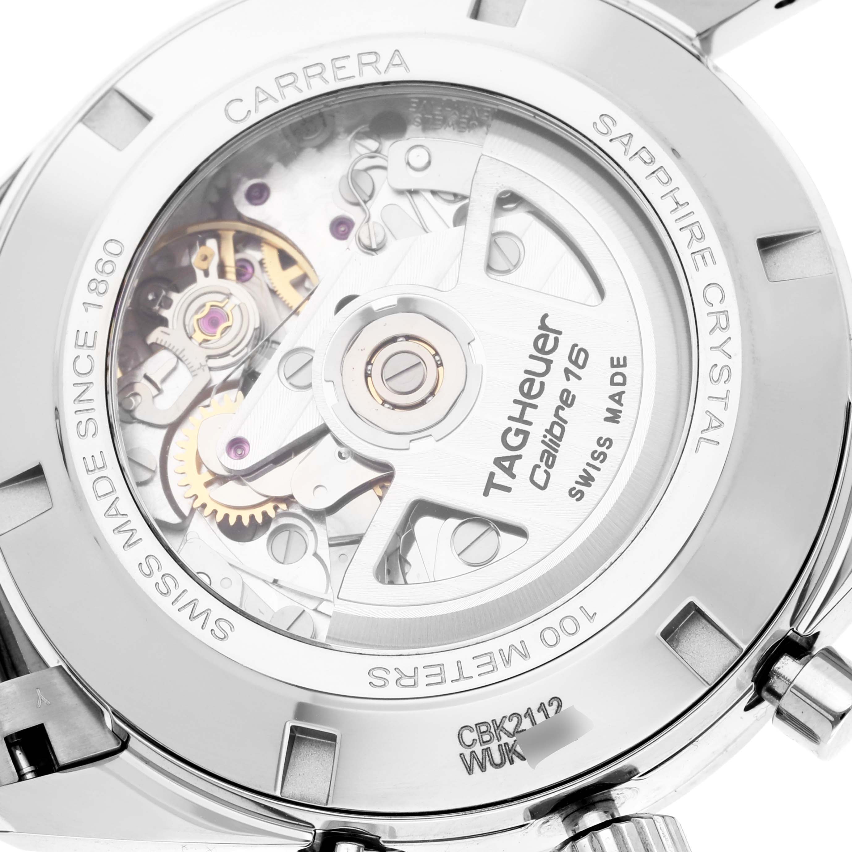 The image shows the back of a Tag Heuer Carrera CBK2112.BA0715 Men's Stainless Steel Blue Dial CBK2112.BA0715 Men's Stainless Steel Blue Dial watch, highlighting its movement and the model information engraved on the casing.