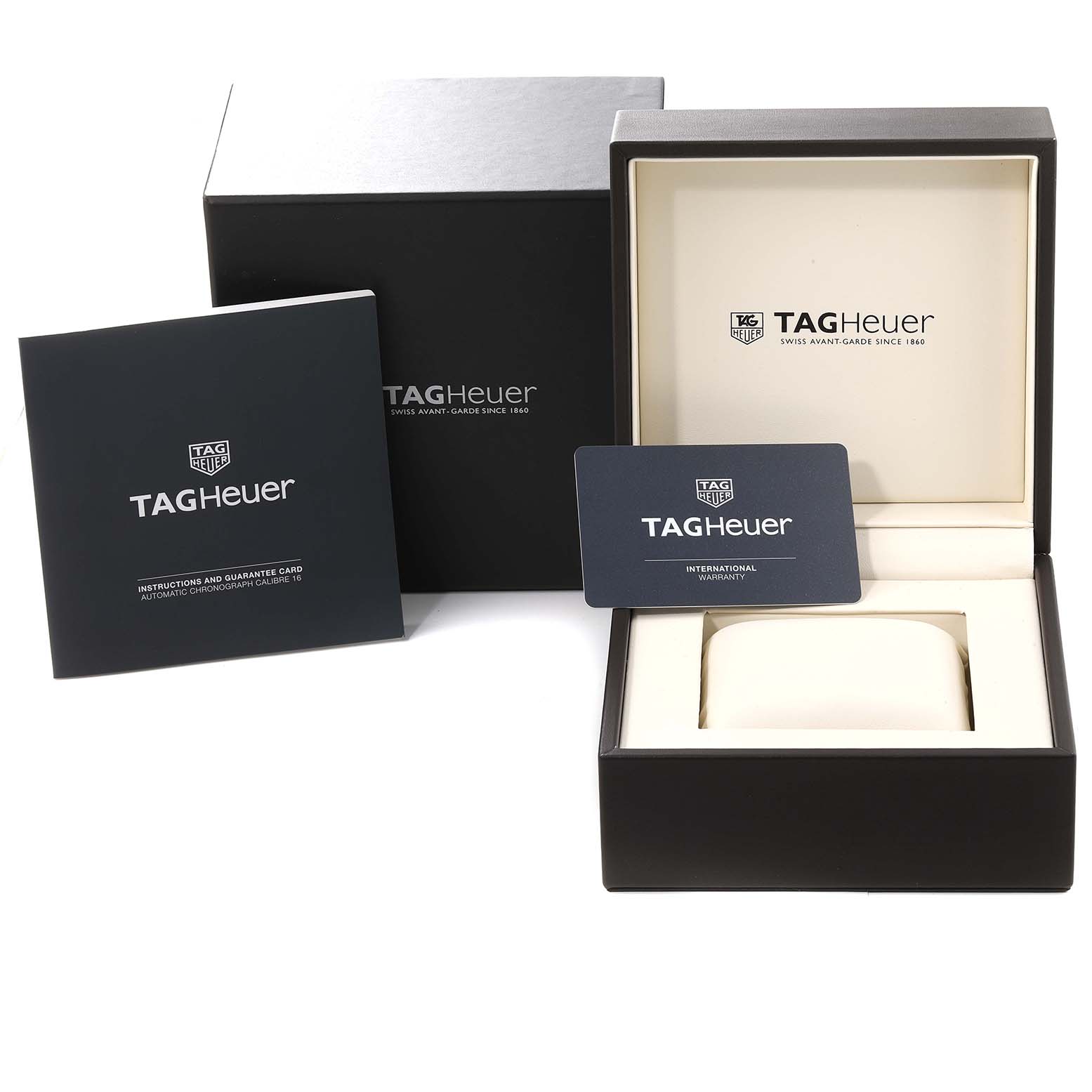 This image shows the packaging, warranty card, and instruction booklet for the Tag Heuer Carrera CBK2112.BA0715 Men's Stainless Steel Blue Dial CBK2112.BA0715 Men's Stainless Steel Blue Dial watch.