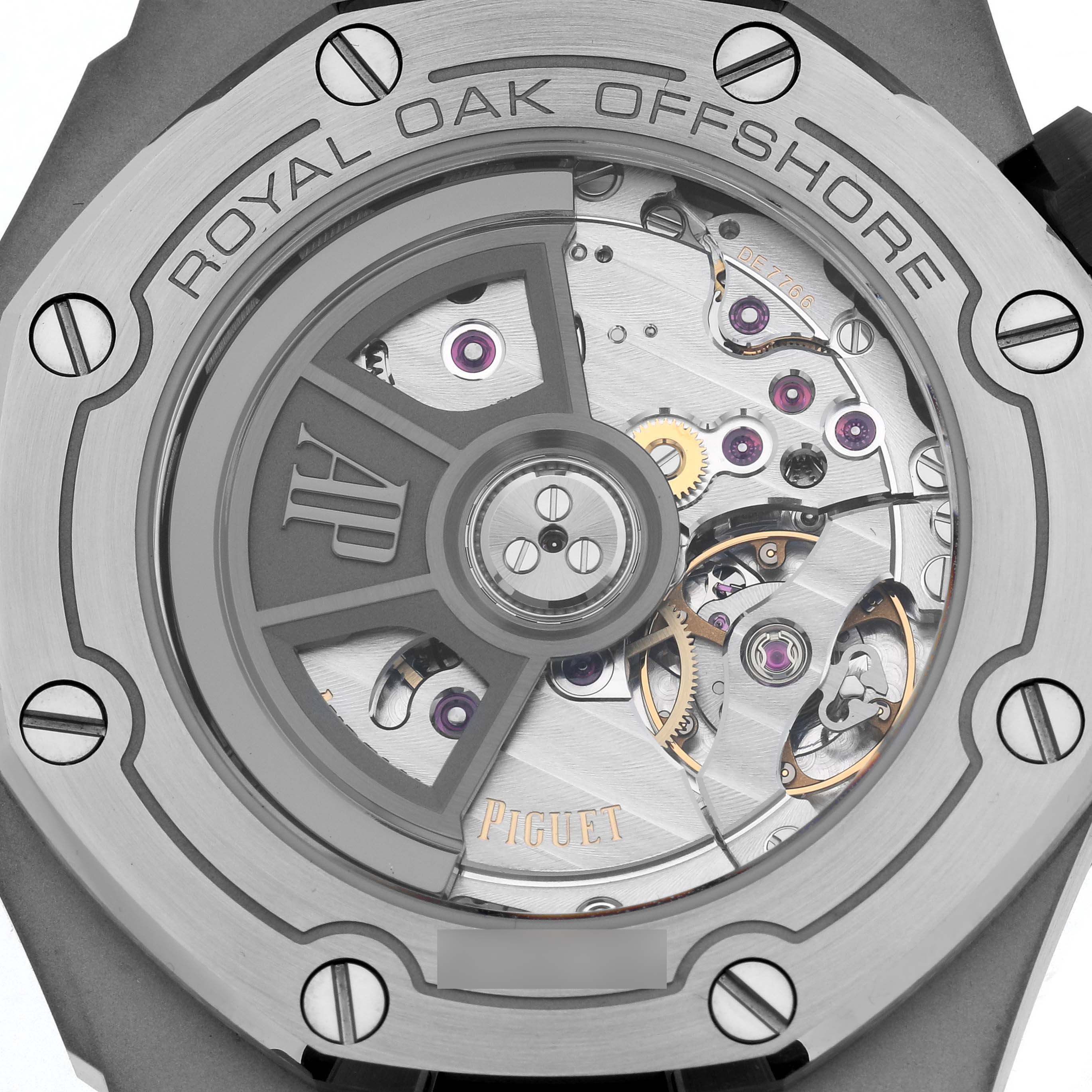 The image shows the case back of the Audemars Piguet Royal Oak Offshore 15720ST Men
s Stainless Steel Green Dial 15720ST Men
s Stainless Steel Green Dial watch, highlighting its intricate movement.