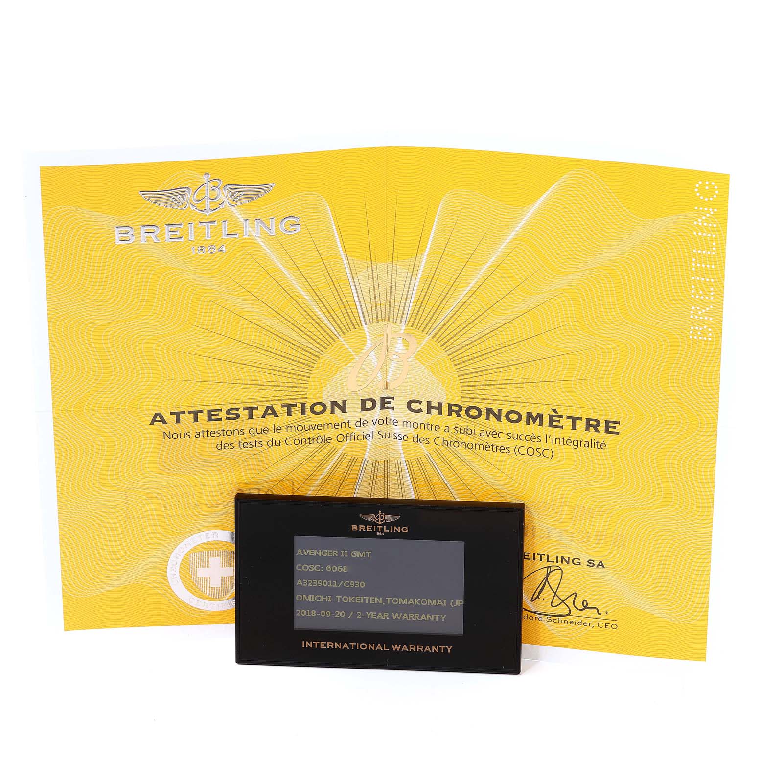 The image shows a certification document and warranty card for a Breitling Avenger A3239011-C872-170A Men
s Stainless Steel Mother of Pearl Dial A3239011-C872-170A Men
s Stainless Steel Mother of Pearl Dial model watch.