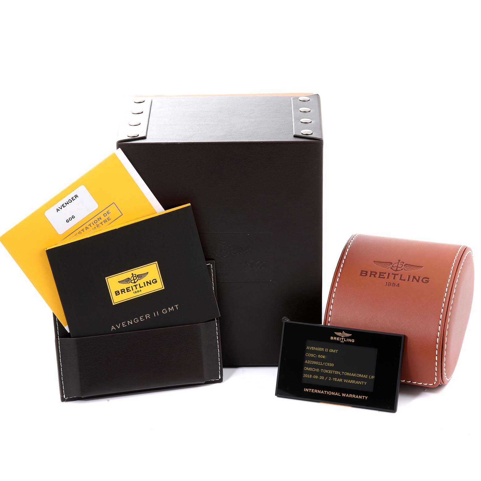 This image shows packaging, manuals, warranty card, and a brown leather case for the Breitling Avenger A3239011-C872-170A Men
s Stainless Steel Mother of Pearl Dial A3239011-C872-170A Men
s Stainless Steel Mother of Pearl Dial II GMT watch.