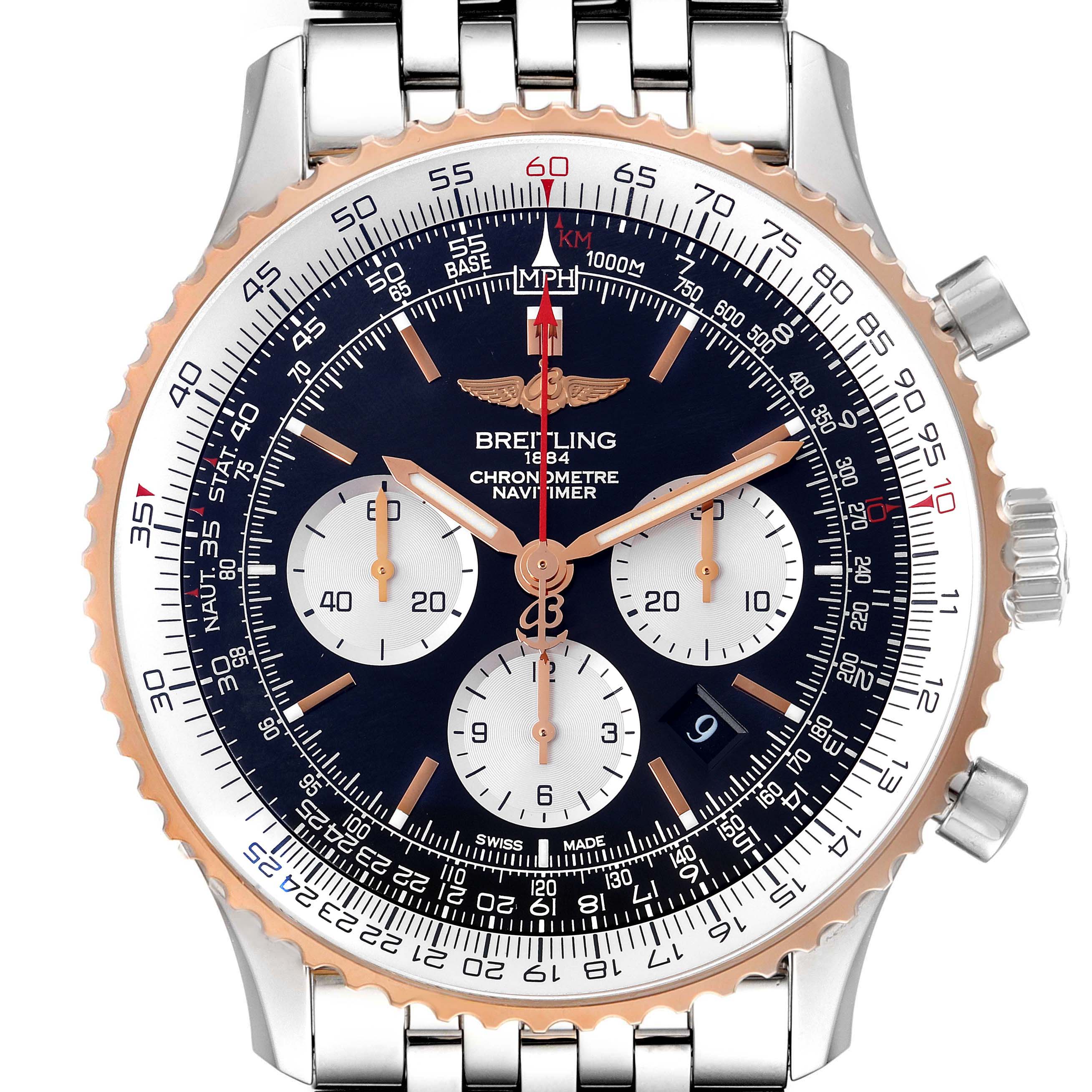 The Breitling Navitimer UB0127 Men
s Steel and Gold (two tone) Black Dial UB0127 Men
s Steel and Gold (two tone) Black Dial watch is shown from a front angle, displaying its dial, bezel, and bracelet.