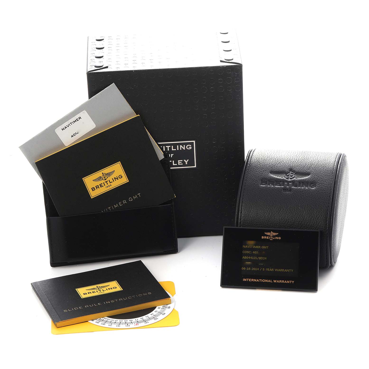 The image shows Breitling Navitimer AB0441 Men
s Stainless Steel Black Dial AB0441 Men
s Stainless Steel Black Dial packaging, manuals, warranty card, and a watch case from a slightly elevated angle.