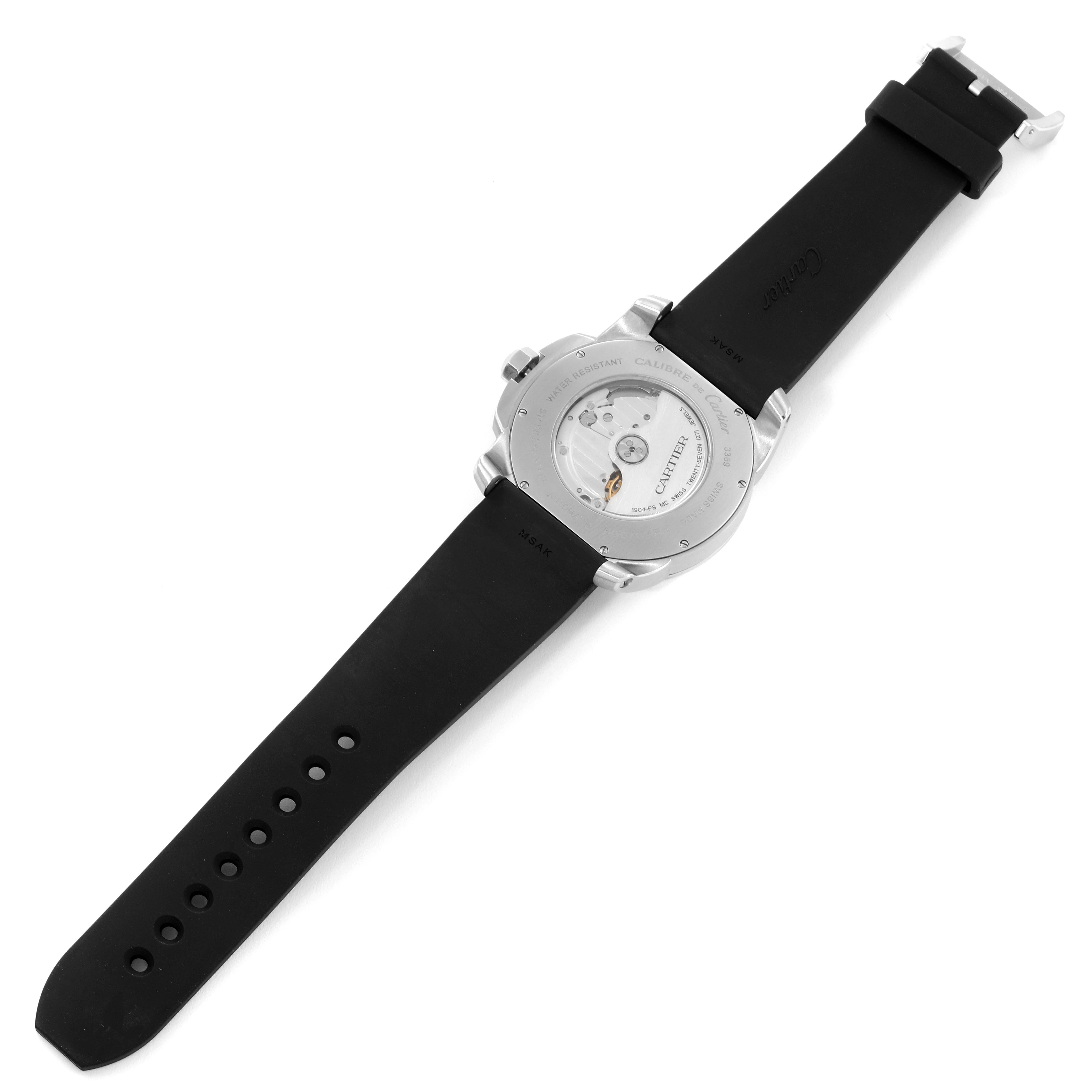 The image shows the back view of a Calibre de Cartier watch by Cartier, highlighting its movement and black strap.