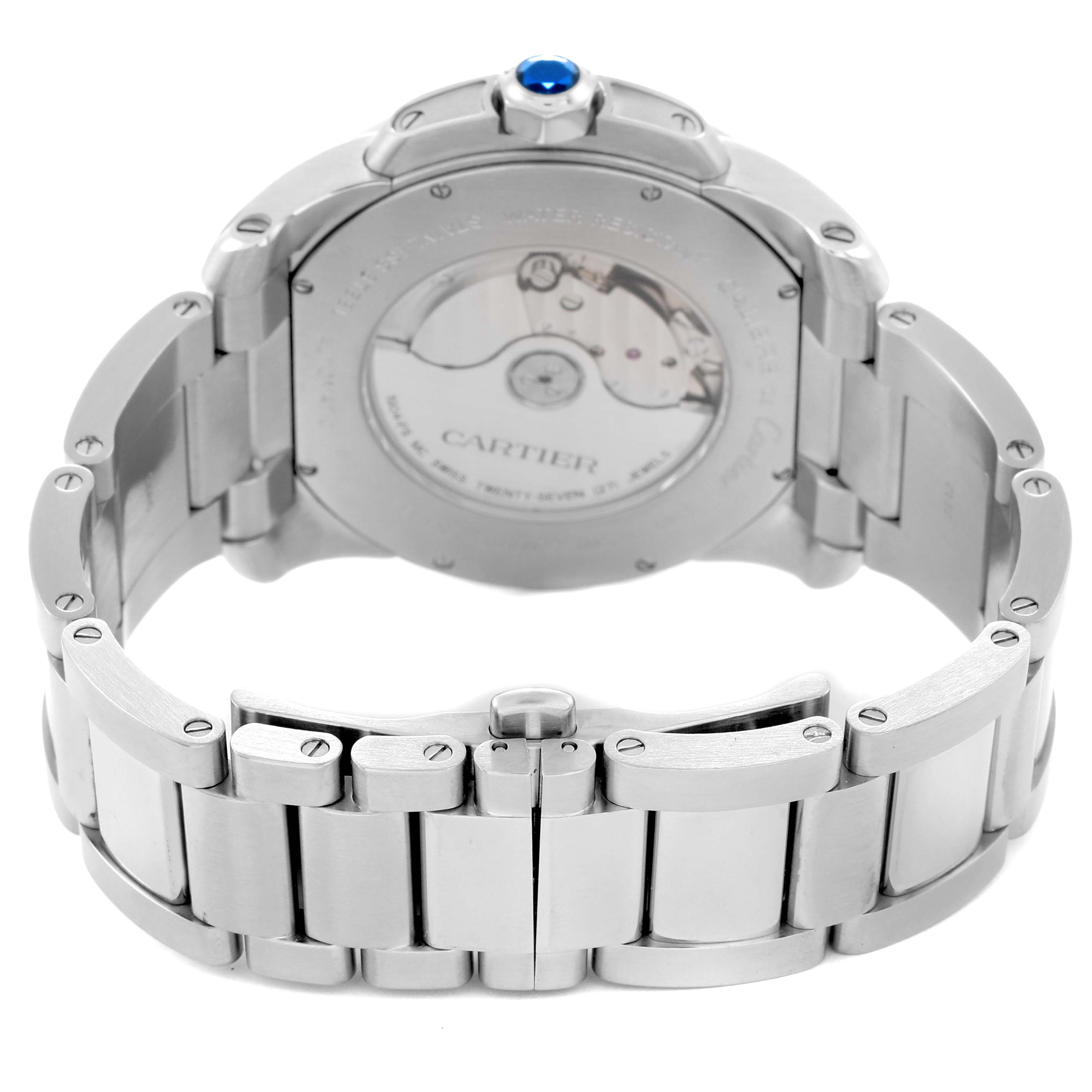 The image shows the back of a Calibre de Cartier watch by Cartier, highlighting its bracelet and open case back.