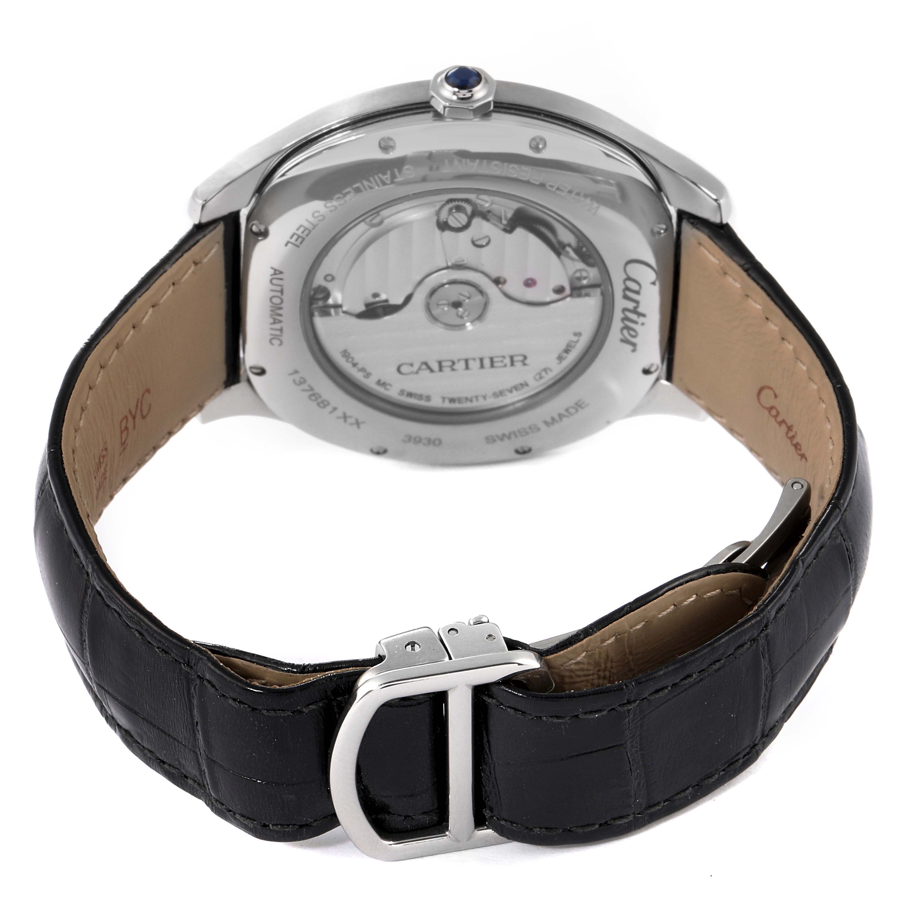 The image shows the back view of a Drive de Cartier watch by Cartier, featuring its automatic movement and black leather strap.