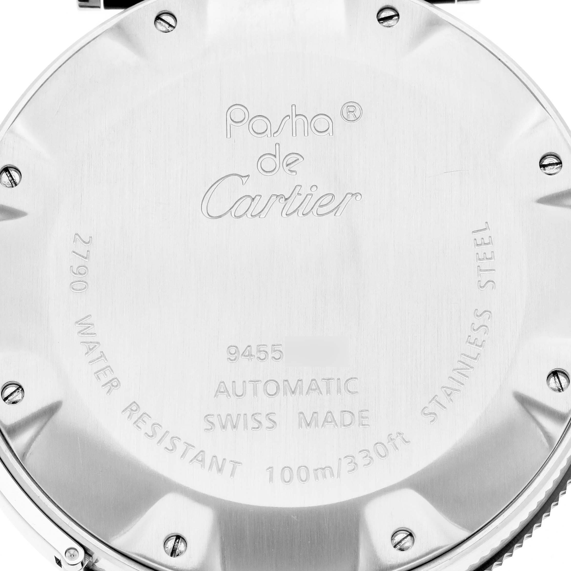 The image shows the back case of a Cartier Pasha W31077U2 Men
s Stainless Steel Black Dial W31077U2 Men
s Stainless Steel Black Dial watch, featuring engraved details and screws.