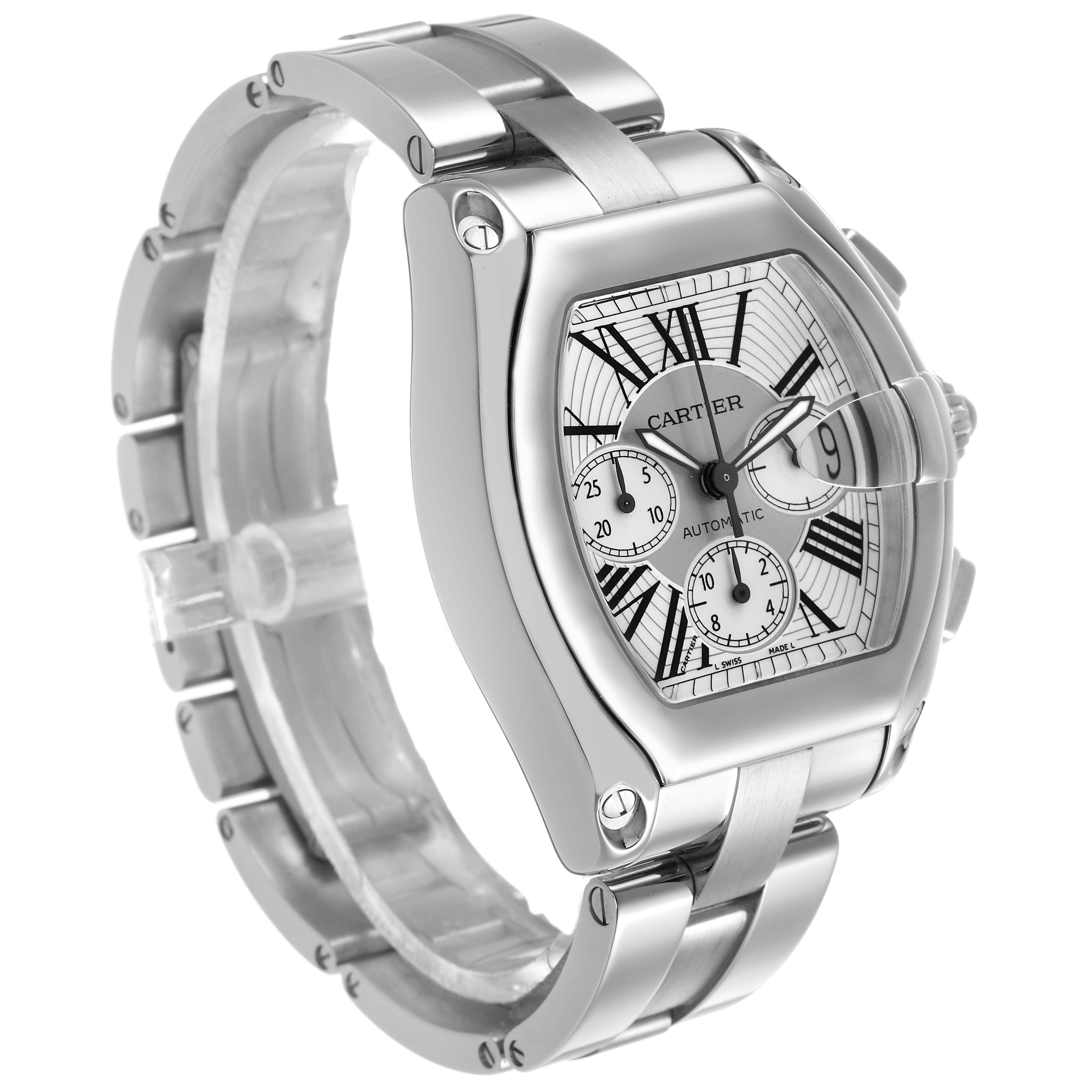 The Cartier Roadster W62019X6 Men's Stainless Steel Silver Dial watch is shown at a front-left angle, featuring its distinctive silver bracelet and detailed dial.