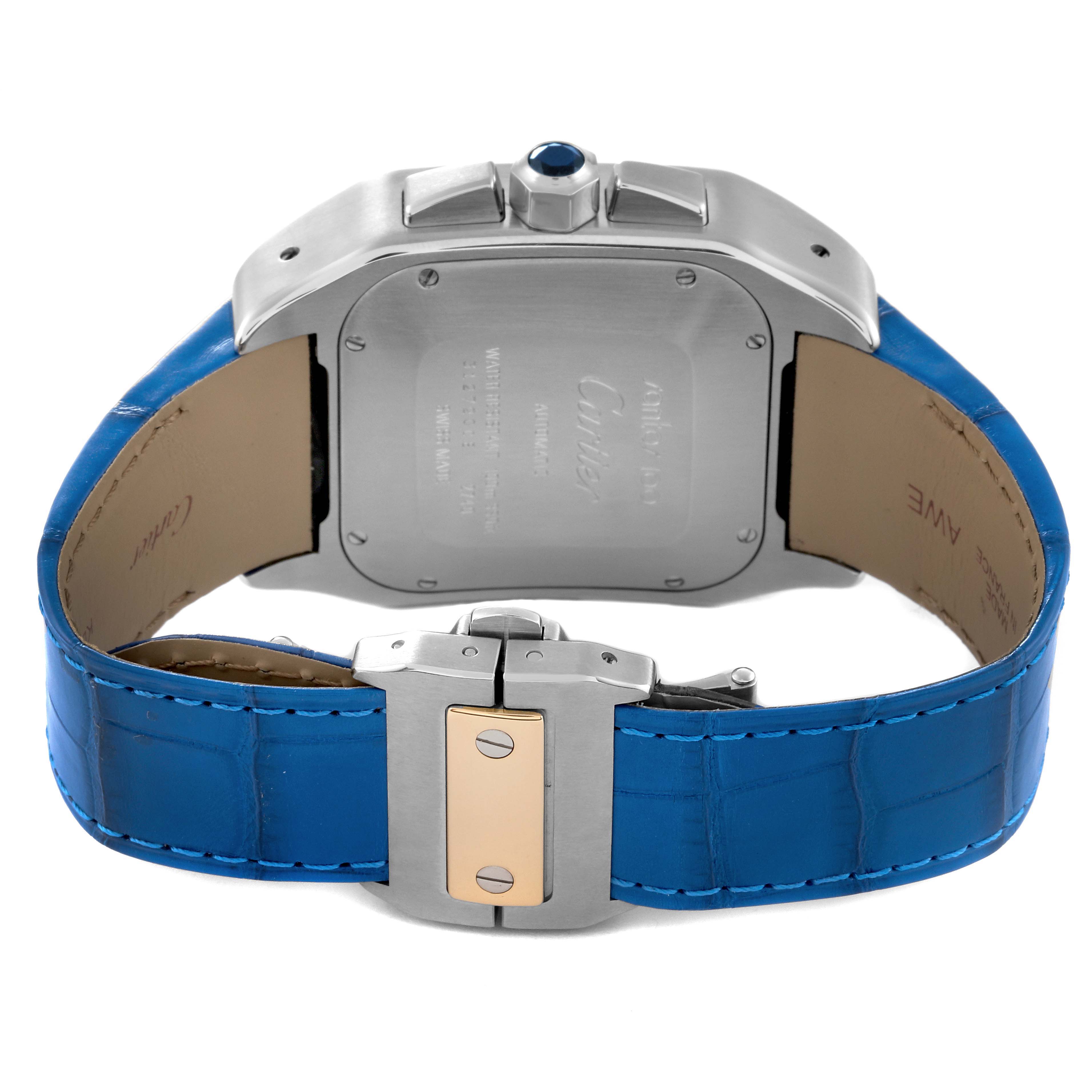 The image shows the back view of a Cartier Santos W20091X7 Men
s Stainless Steel Silver Dial W20091X7 Men
s Stainless Steel Silver Dial watch with a blue leather strap and a stainless steel clasp.