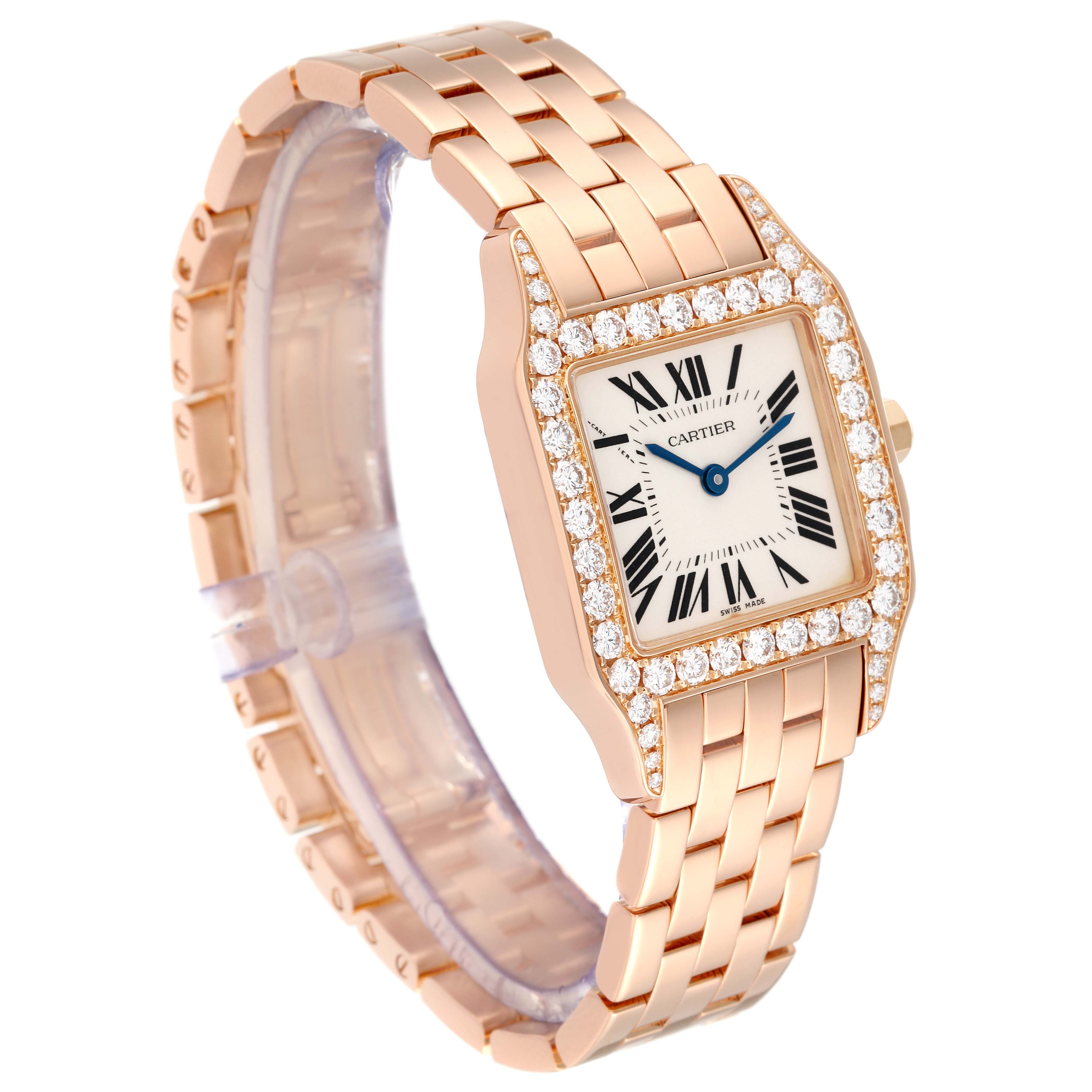 The image shows a Cartier Santos Demoiselle WF9007Z8 Women
s Rose Gold Silver Dial WF9007Z8 Women
s Rose Gold Silver Dial watch at a slight angle, highlighting its rose gold bracelet and diamond-studded square case.
