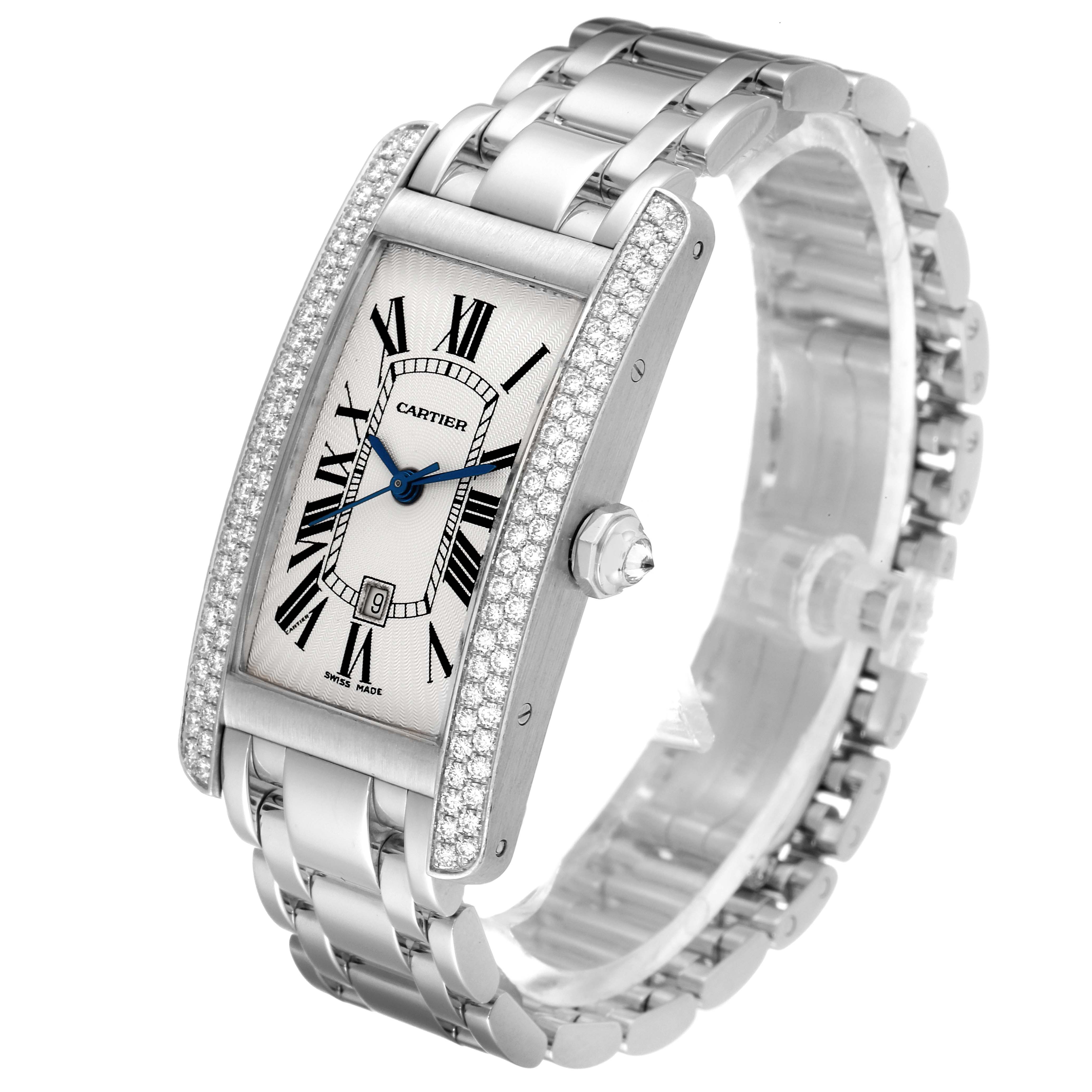 The image shows a Cartier Tank Americaine WB7026L1 Men's White Gold Silver Dial WB7026L1 Men's White Gold Silver Dial watch from a three-quarter angle, highlighting the face, bezel, and bracelet.