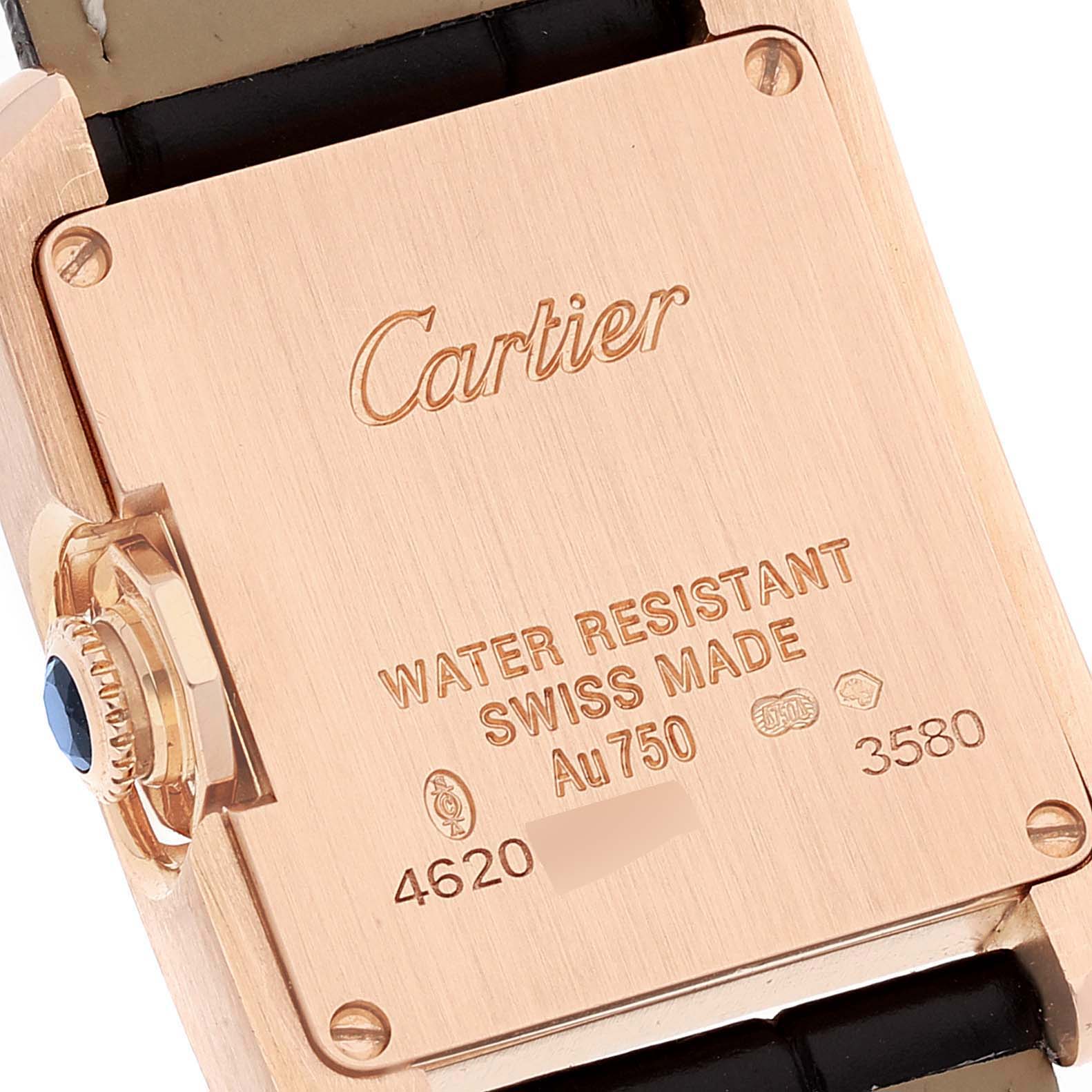 This image shows the case back and crown of a Cartier Tank Anglaise WJTA0007 Women's Rose Gold Silver Dial WJTA0007 Women's Rose Gold Silver Dial watch.