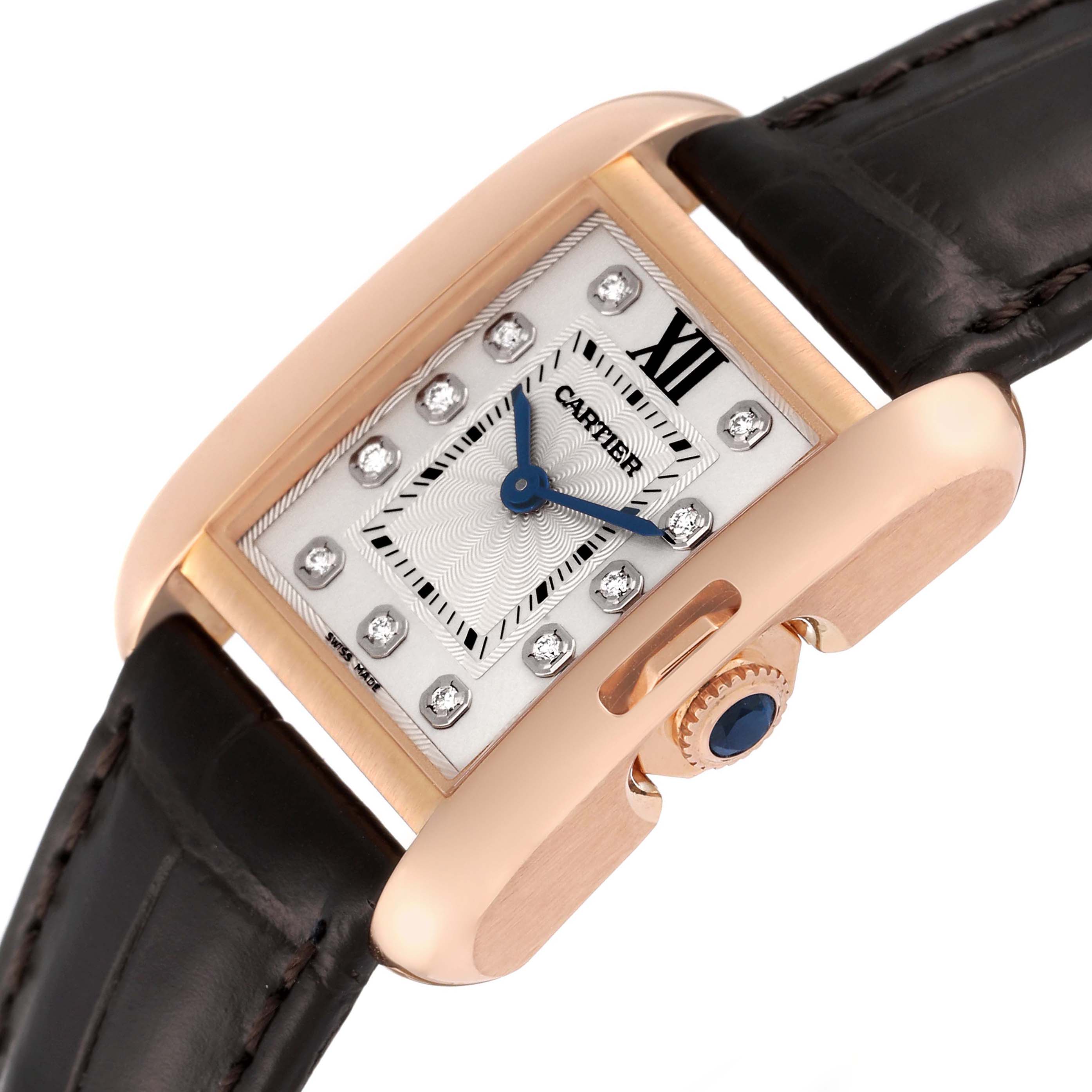 The image shows a close-up angle of the Cartier Tank Anglaise WJTA0007 Women's Rose Gold Silver Dial WJTA0007 Women's Rose Gold Silver Dial watch, highlighting the dial, crown, and part of the leather strap.
