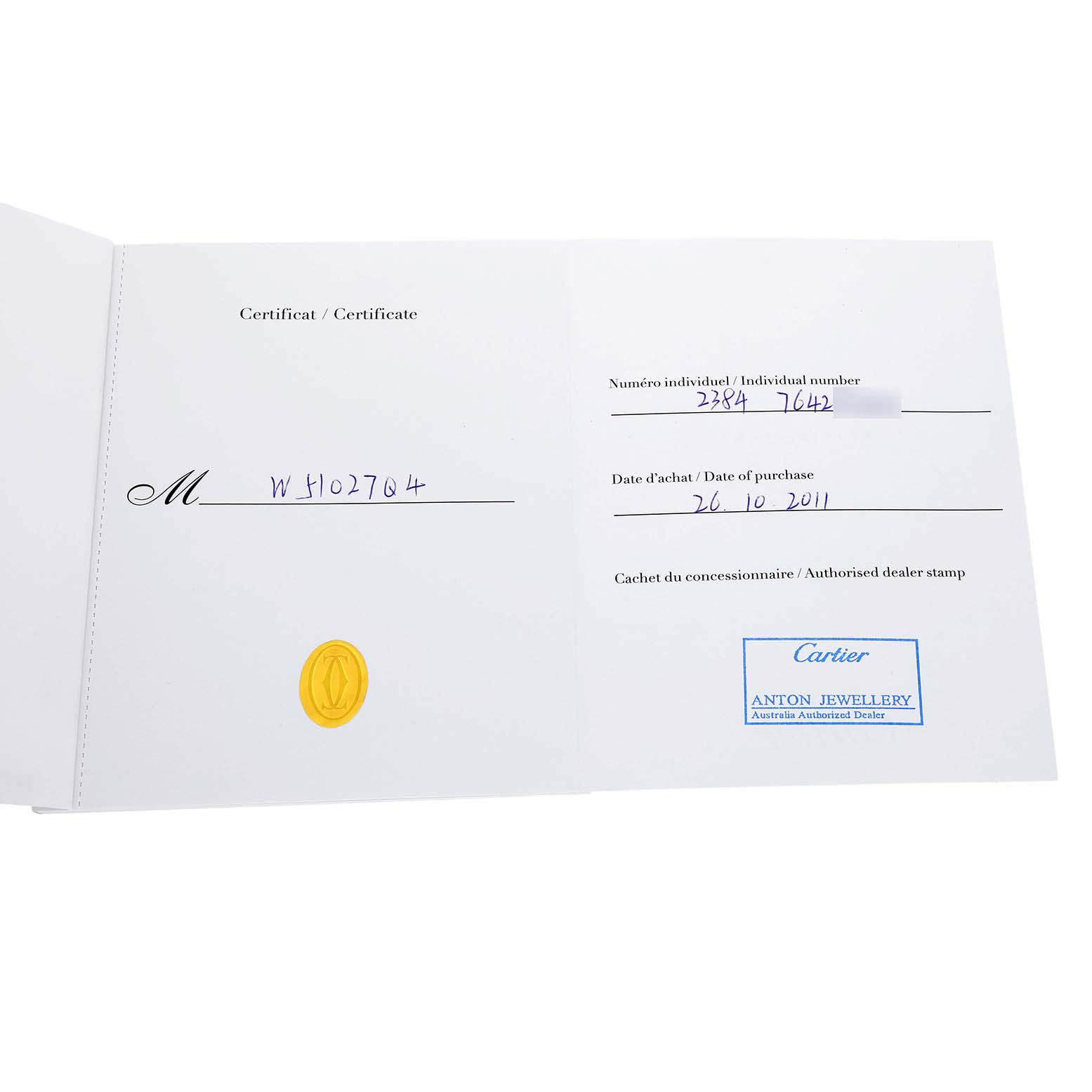 This image shows the open certificate booklet for the Cartier Tank Francaise W51027Q4 Women's Steel and Gold (two tone) Mother of Pearl Dial, displaying purchase details and dealer stamp.