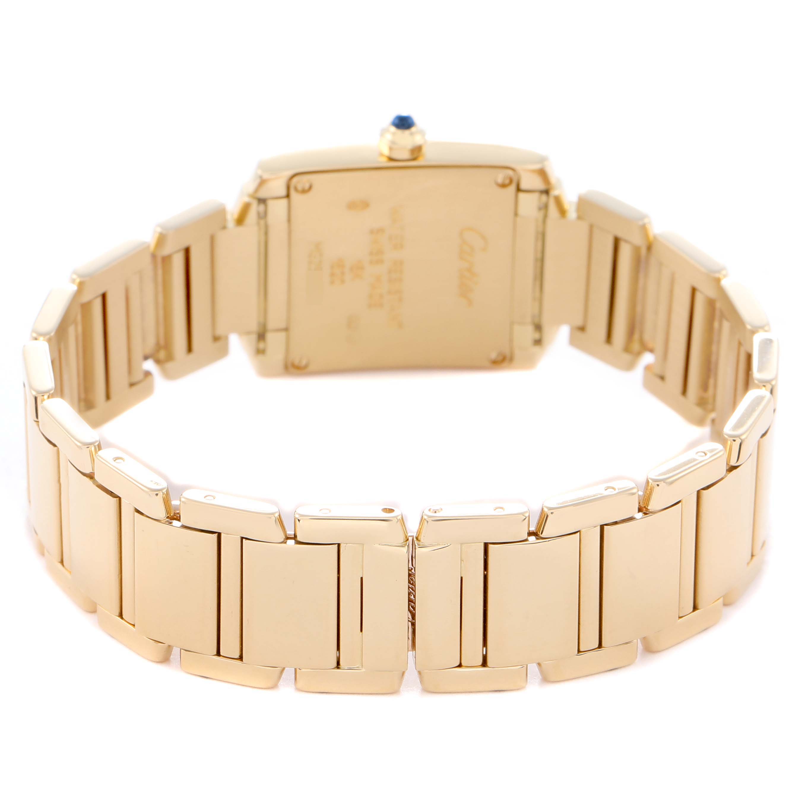 The image shows the back view of a Cartier Tank Francaise W50002N2 Women's Yellow Gold Silver Dial W50002N2 Women's Yellow Gold Silver Dial watch, highlighting its gold bracelet and case back with engravings.