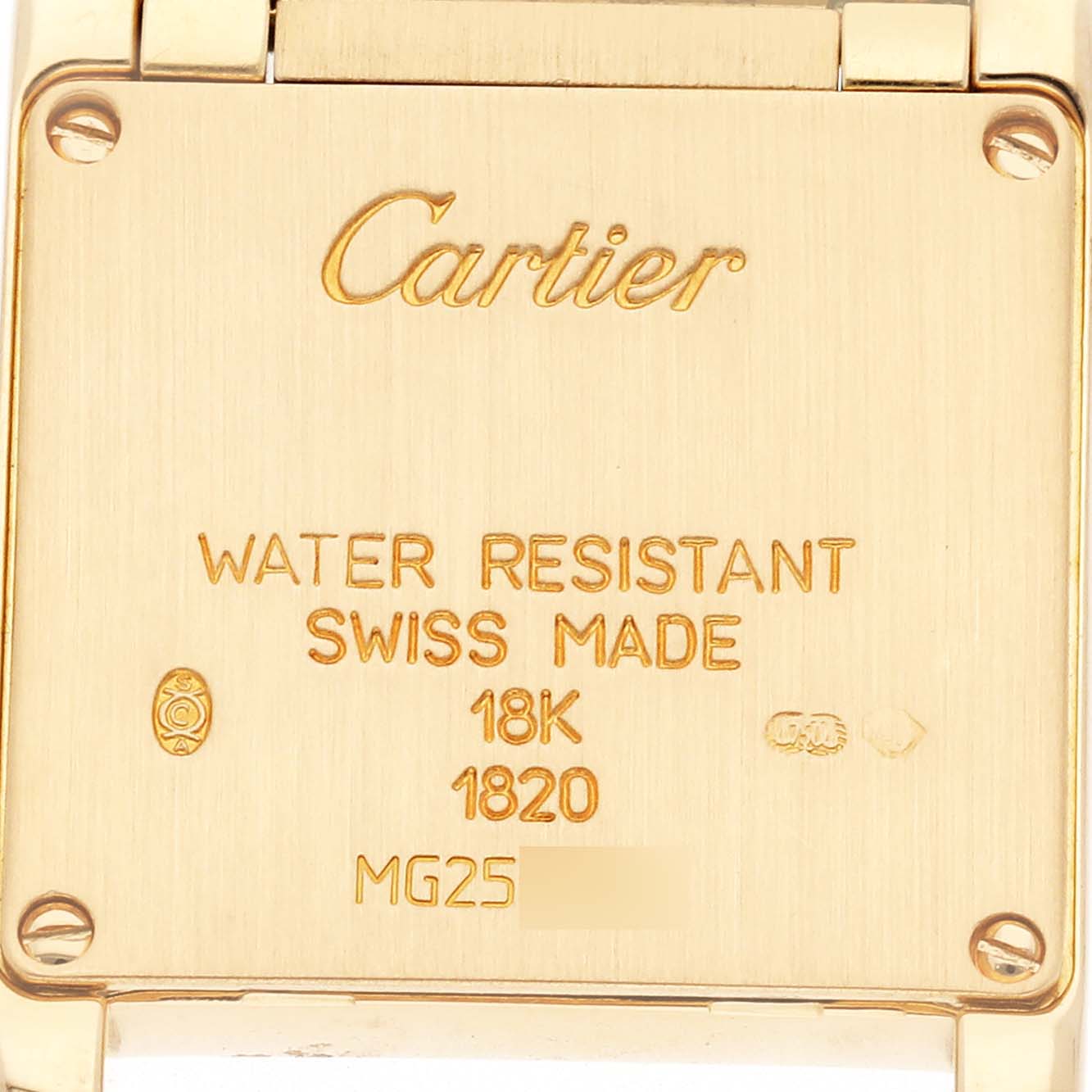 The image shows the back of a Cartier Tank Francaise W50002N2 Women's Yellow Gold Silver Dial W50002N2 Women's Yellow Gold Silver Dial watch with engravings indicating details like water resistance and gold content.
