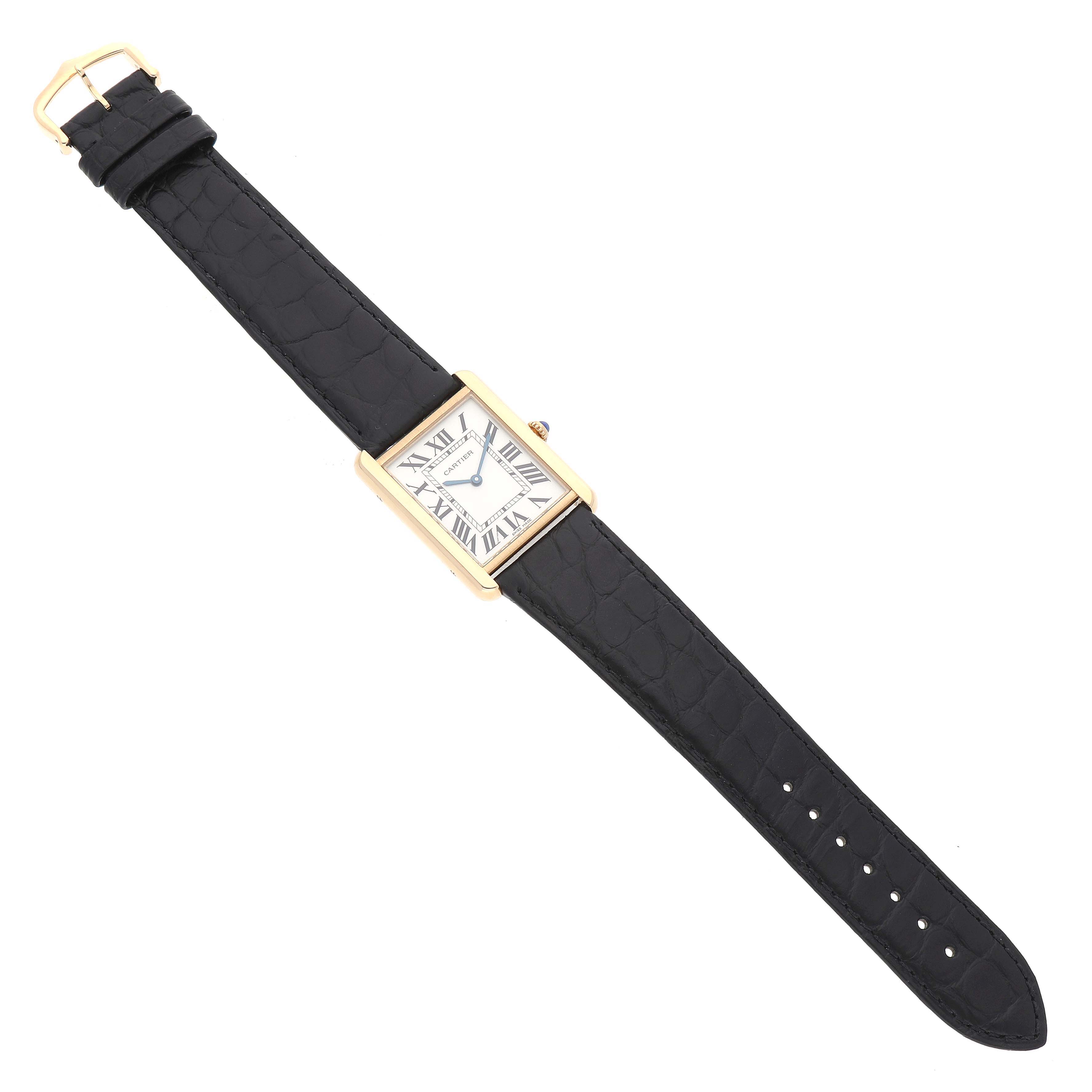 The Cartier Tank Solo W5200004 Men's Steel and Gold (two tone) Silver Dial watch is shown from a top-down angle, displaying its face, rectangular case, and leather strap.