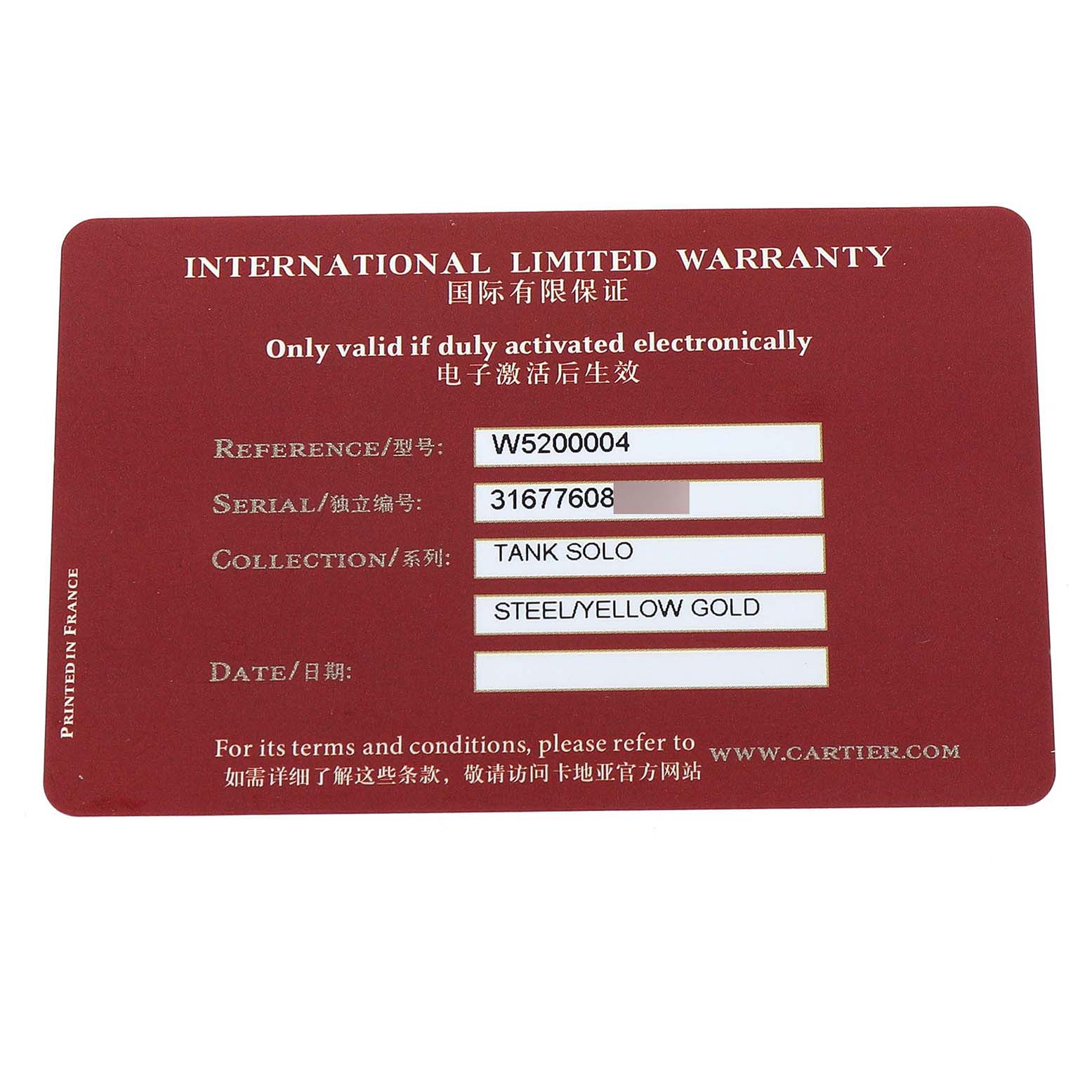 The image shows the Cartier Tank Solo W5200004 Men's Steel and Gold (two tone) Silver Dial's International Limited Warranty card with reference and serial numbers.