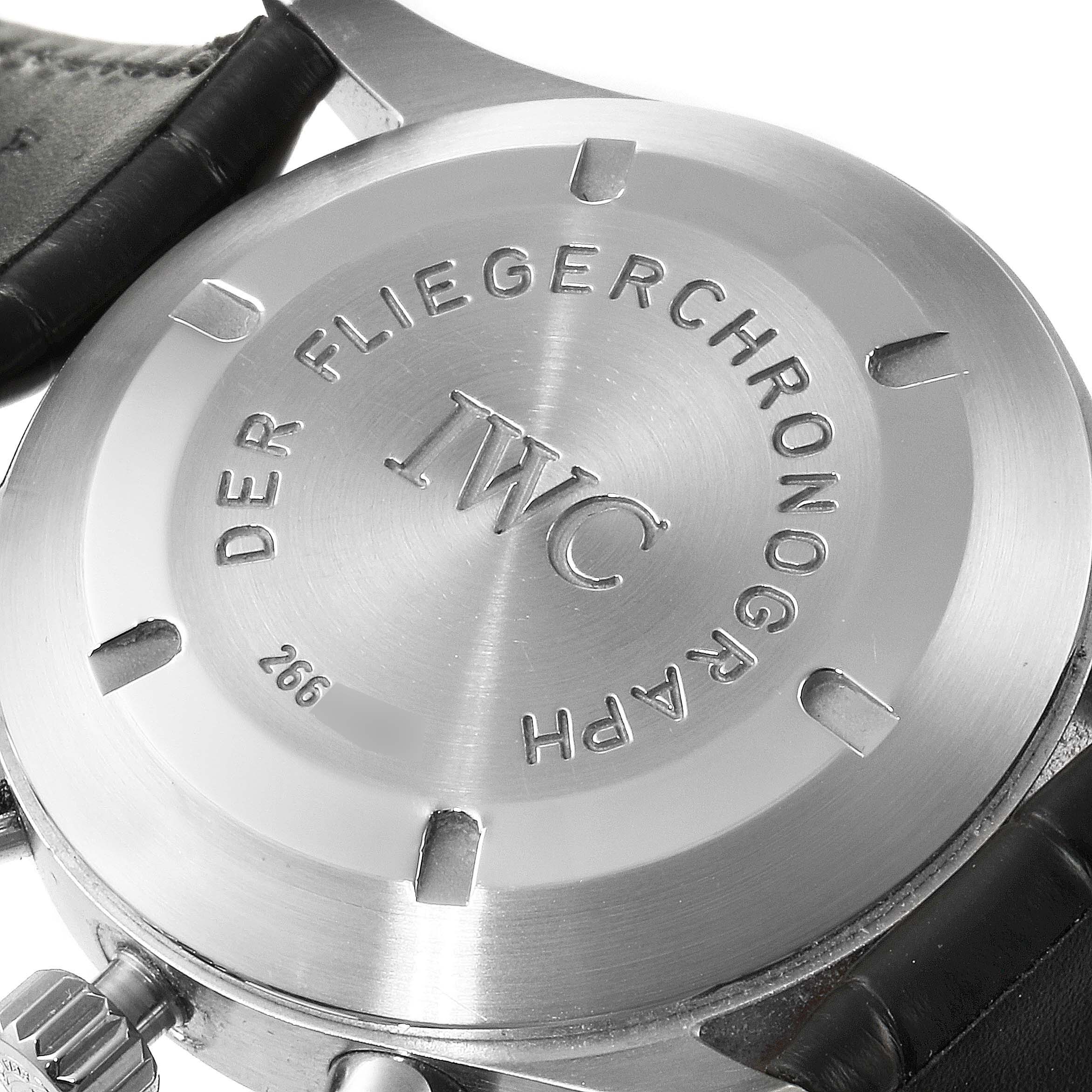 This image shows the case back of an IWC Pilot IW370603 Men's Stainless Steel Black Dial IW370603 Men's Stainless Steel Black Dial model watch, featuring the engraved branding and model name, along with the leather strap attachment.