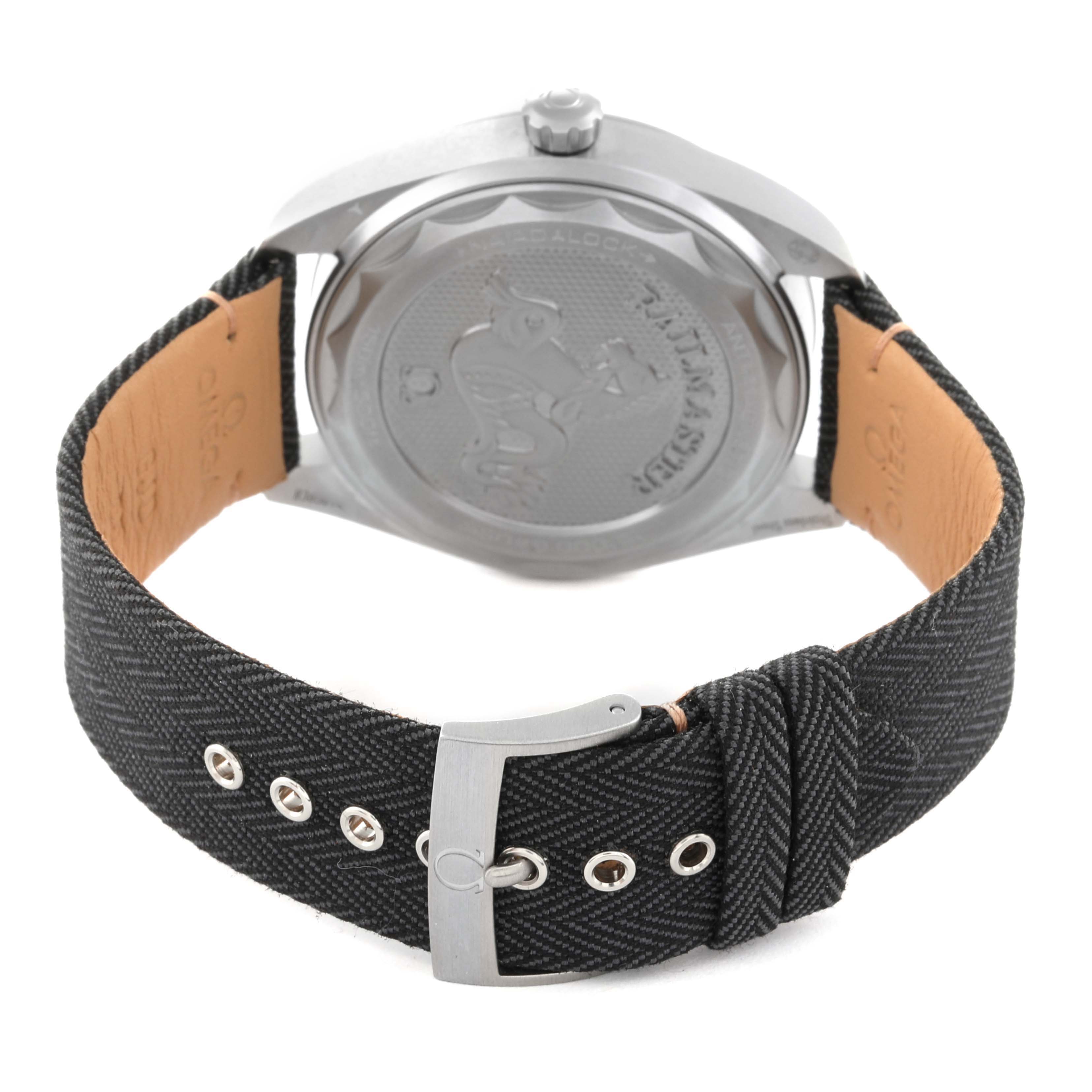 The image shows the back view of the Omega Aqua Terra 220.12.40.20.01.001 Men's Stainless Steel Black Dial 220.12.40.20.01.001 Men's Stainless Steel Black Dial watch, highlighting its rear case and fabric strap with a buckle.