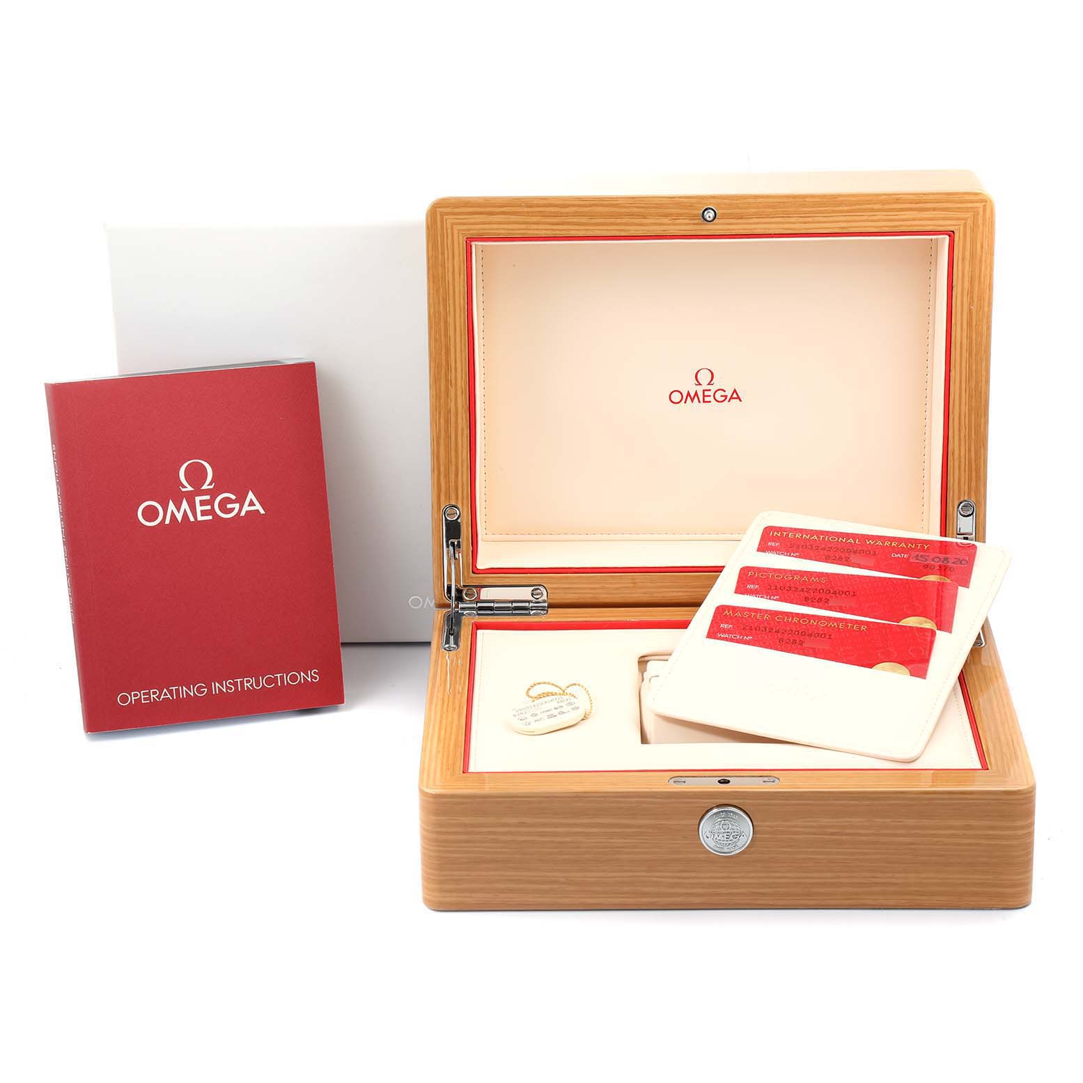 The image shows the accessories of an Omega Seamaster 210.32.42.20.04.001 Men's Stainless Steel White Dial 210.32.42.20.04.001 Men's Stainless Steel White Dial watch, including a wooden box, warranty cards, and operating instructions.