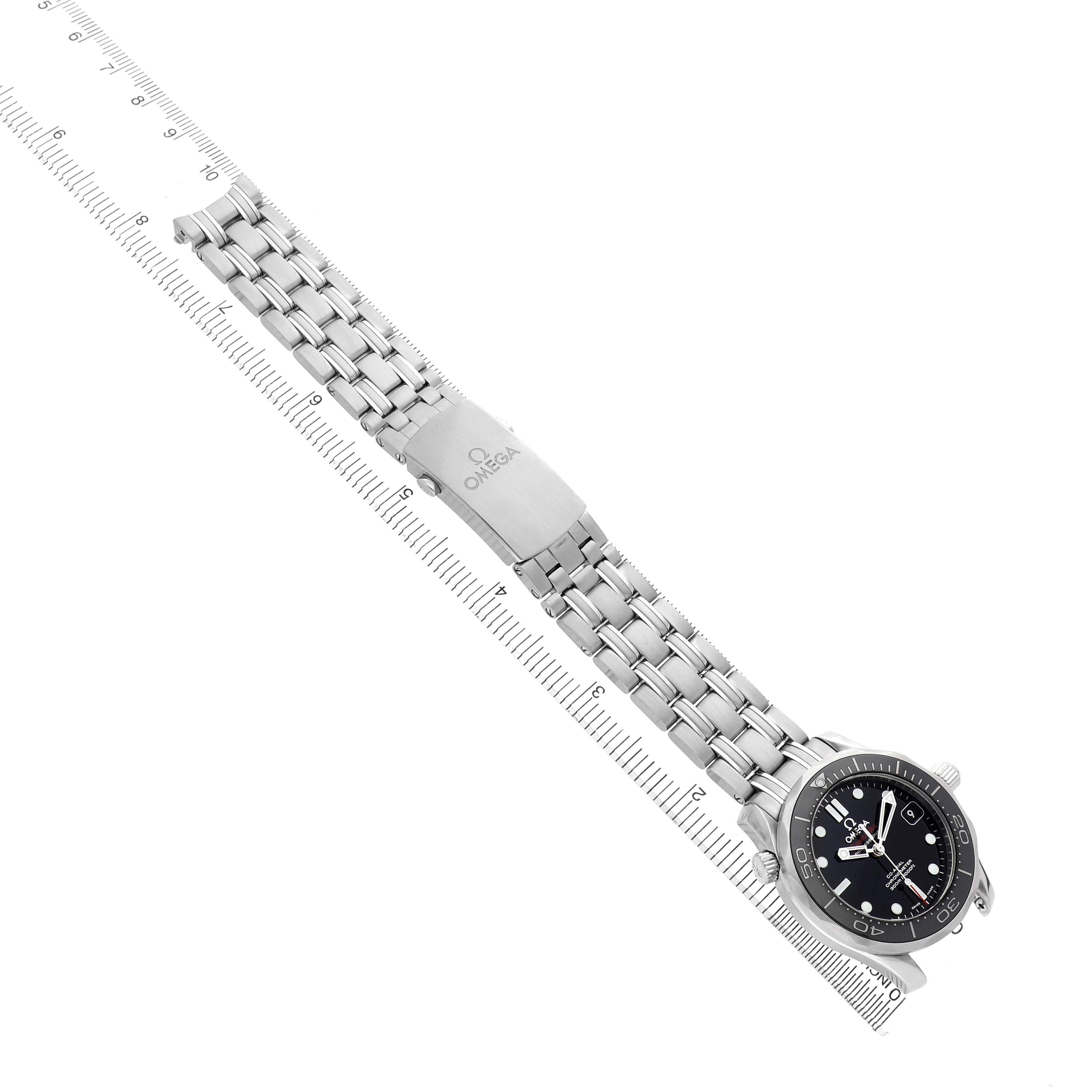 The Omega Seamaster 212.30.36.20.01.002 Men's Stainless Steel Black Dial watch is shown at a diagonal angle, displaying the stainless steel bracelet and clasp alongside the watch face.