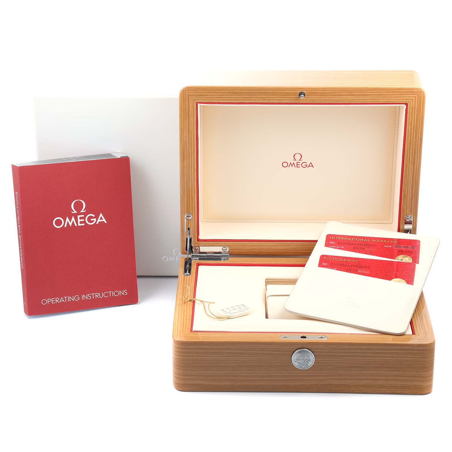 An Omega Seamaster 212.30.41.20.03.001 Men's Stainless Steel Blue Dial 212.30.41.20.03.001 Men's Stainless Steel Blue Dial watch box is shown with operating instructions, warranty card, and accessories from a front angle.