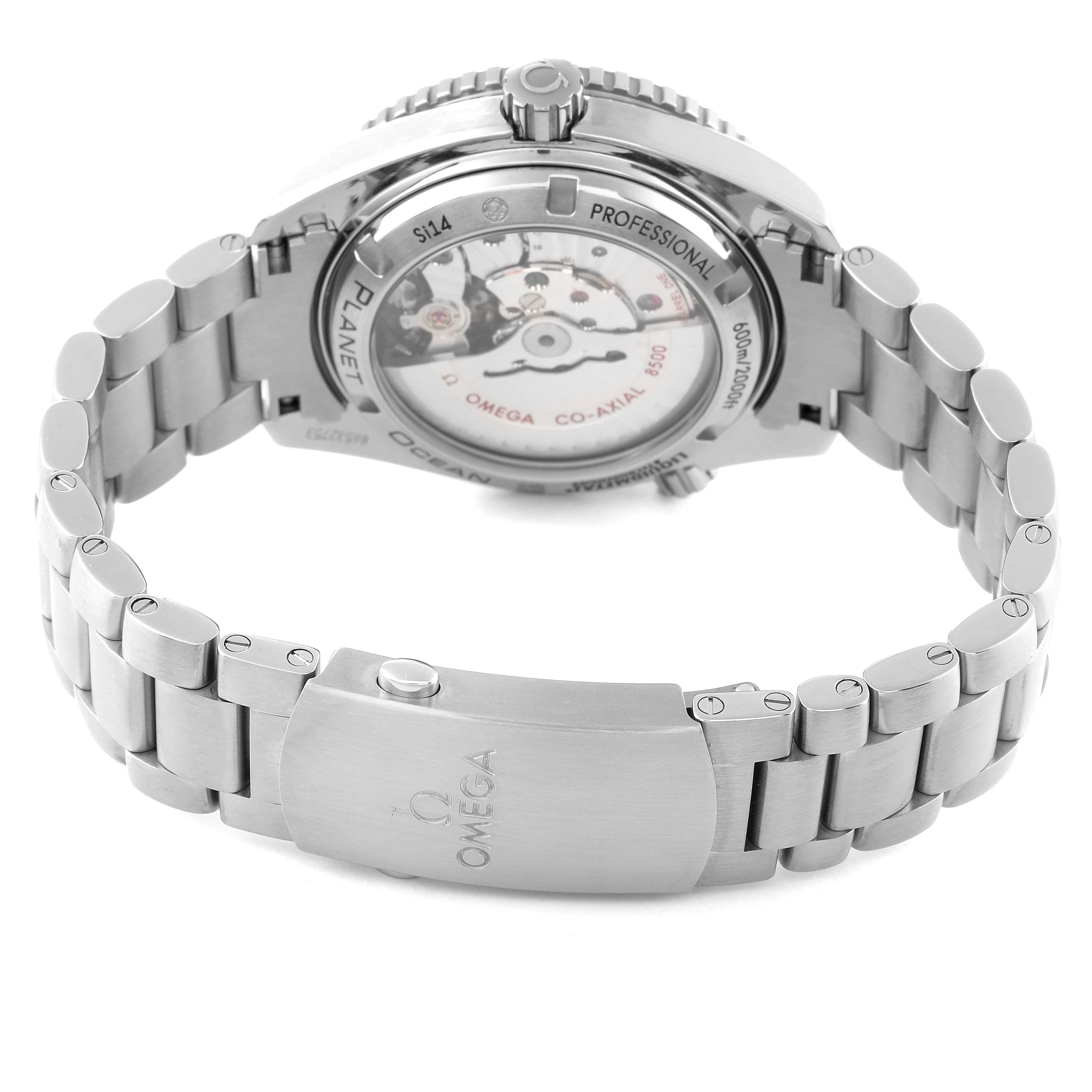 The image shows the reverse side of the Omega Planet Ocean 232.90.42.21.03.001 Men's Titanium Blue Dial 232.90.42.21.03.001 Men's Titanium Blue Dial watch, highlighting its transparent case back and stainless steel bracelet.