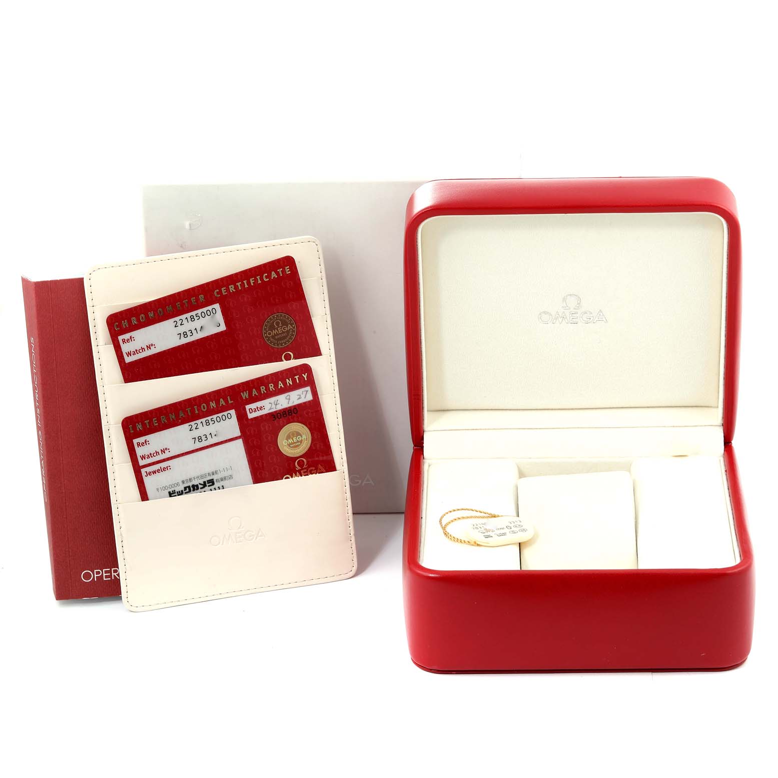 The image shows the packaging, cards, and manuals for the Omega Planet Ocean 2218.50.00 Men
s Stainless Steel Black Dial 2218.50.00 Men
s Stainless Steel Black Dial watch displayed from the front.