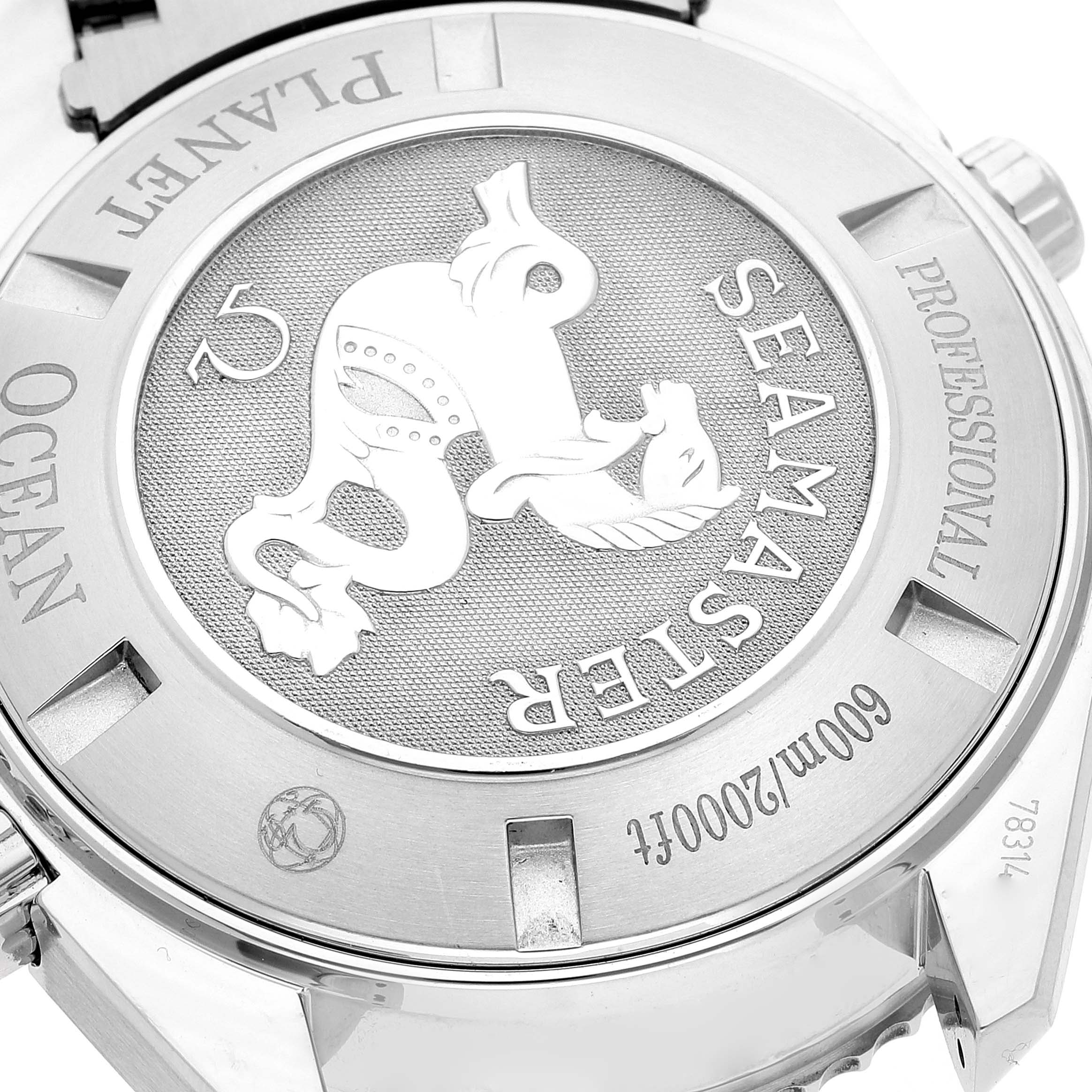 The image shows the back case of the Omega Planet Ocean 2218.50.00 Men
s Stainless Steel Black Dial 2218.50.00 Men
s Stainless Steel Black Dial watch, highlighting the Seamaster emblem and professional depth rating engravings.
