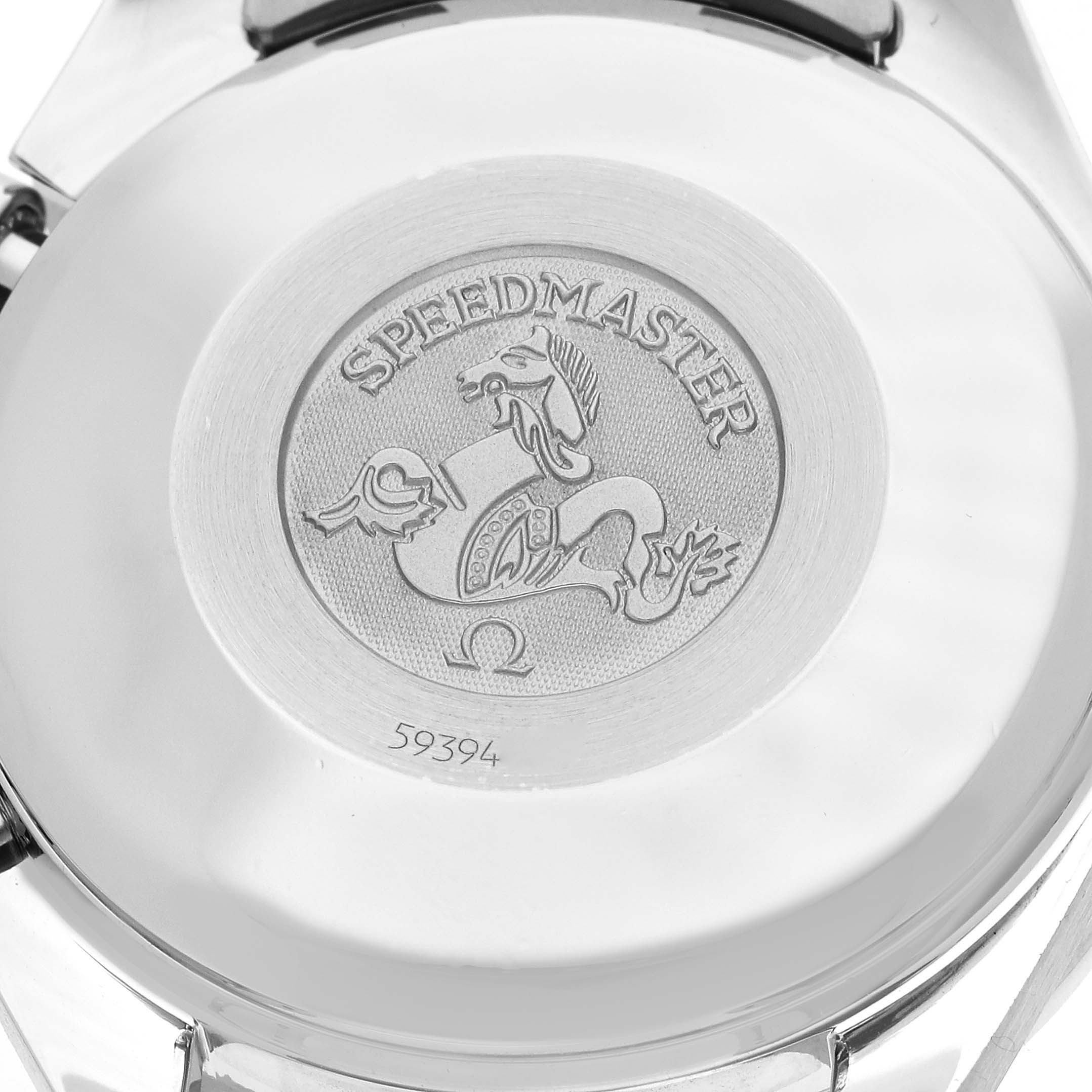 The image shows the case back of an Omega Speedmaster 3513.50.00 Men
s Stainless Steel Black Dial 3513.50.00 Men
s Stainless Steel Black Dial watch with its engraved emblem and serial number.