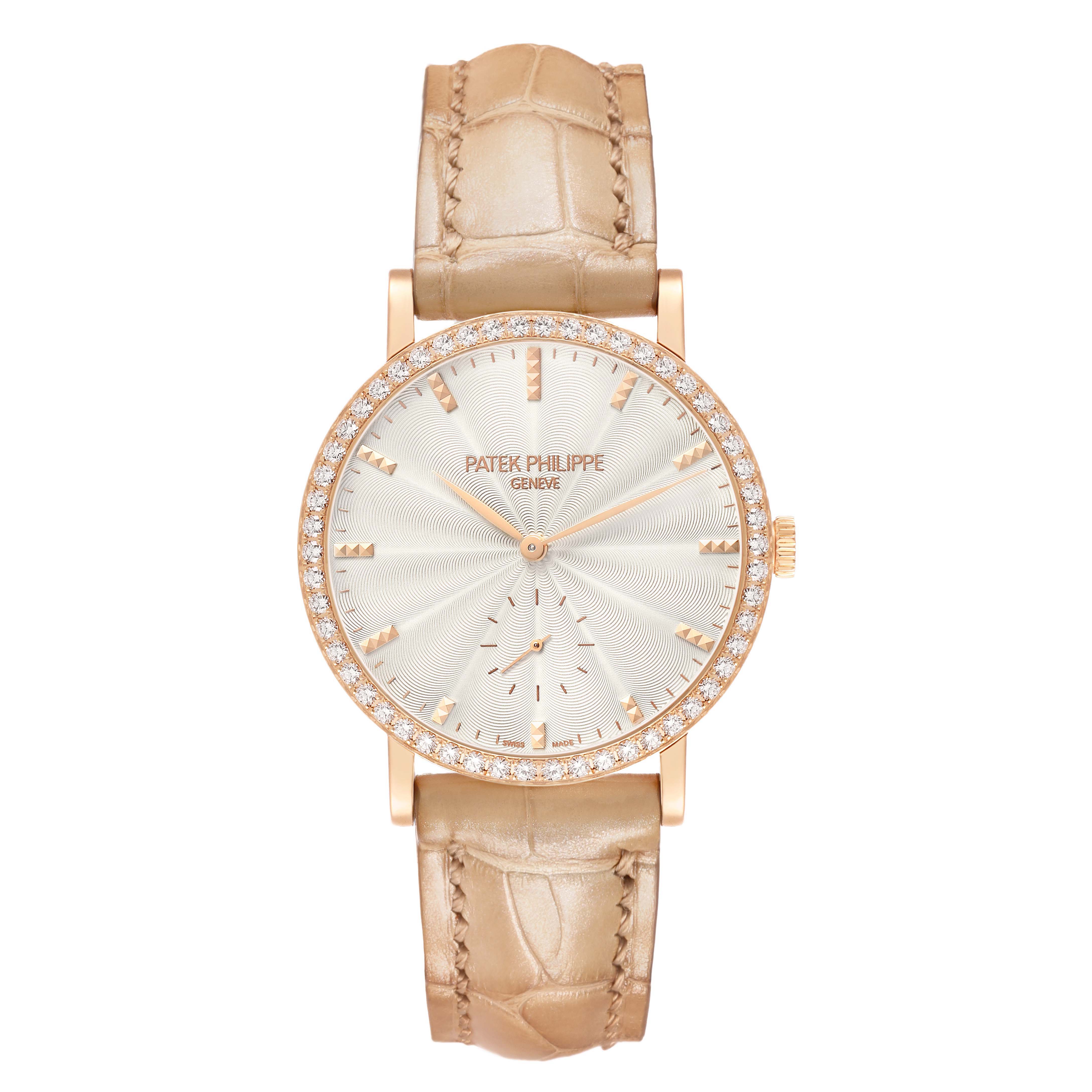 The Patek Philippe Calatrava 7120R-001 Women's Rose Gold Beige Dial watch is shown from a top view, highlighting its dial, bezel, and leather strap.
