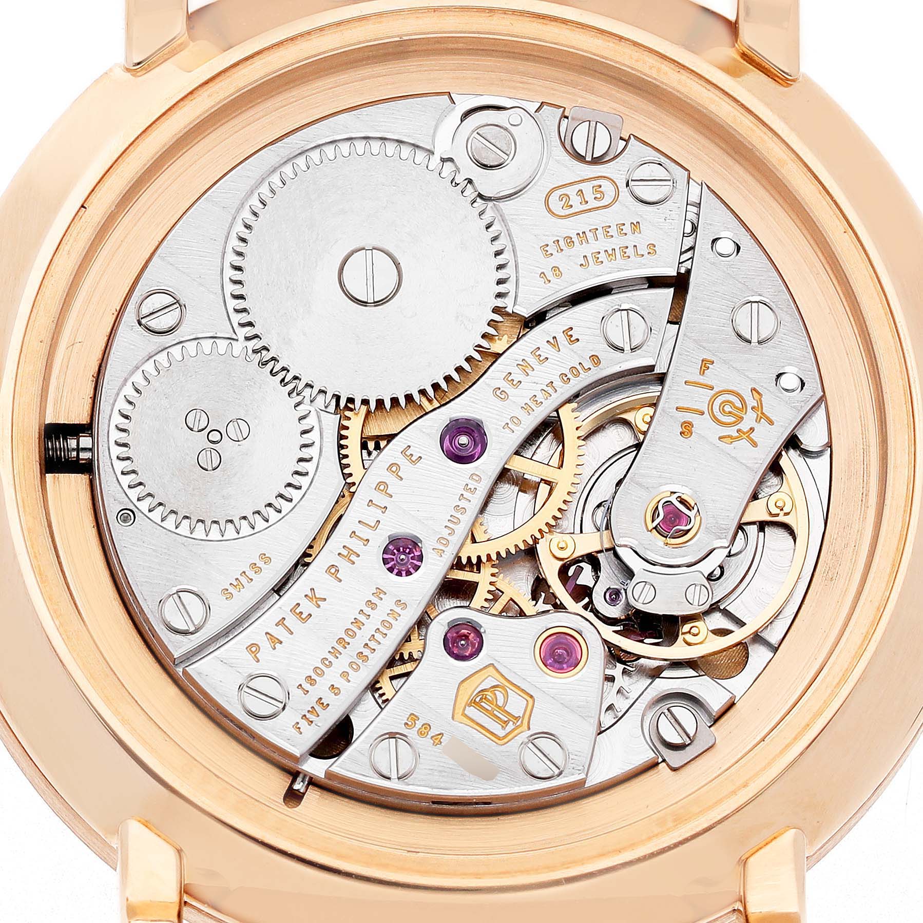 The image shows the back view of a Patek Philippe Calatrava 7120R-001 Women's Rose Gold Beige Dial, highlighting its intricate mechanical movement.