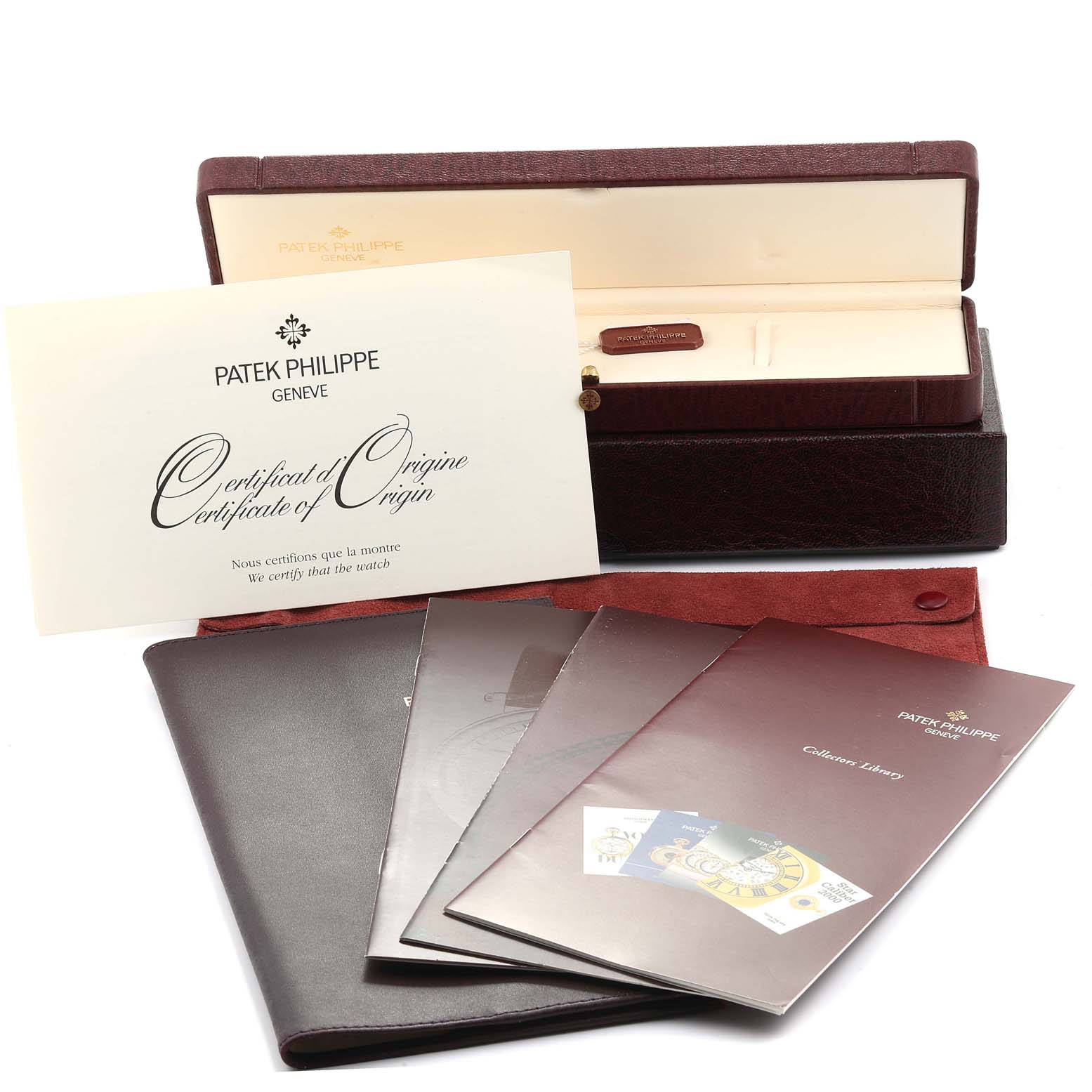 The image shows the packaging and accessories for a Patek Philippe Complications 5054 Men's Rose Gold White Dial 5054 Men's Rose Gold White Dial watch, including the box, certificate, and manuals.