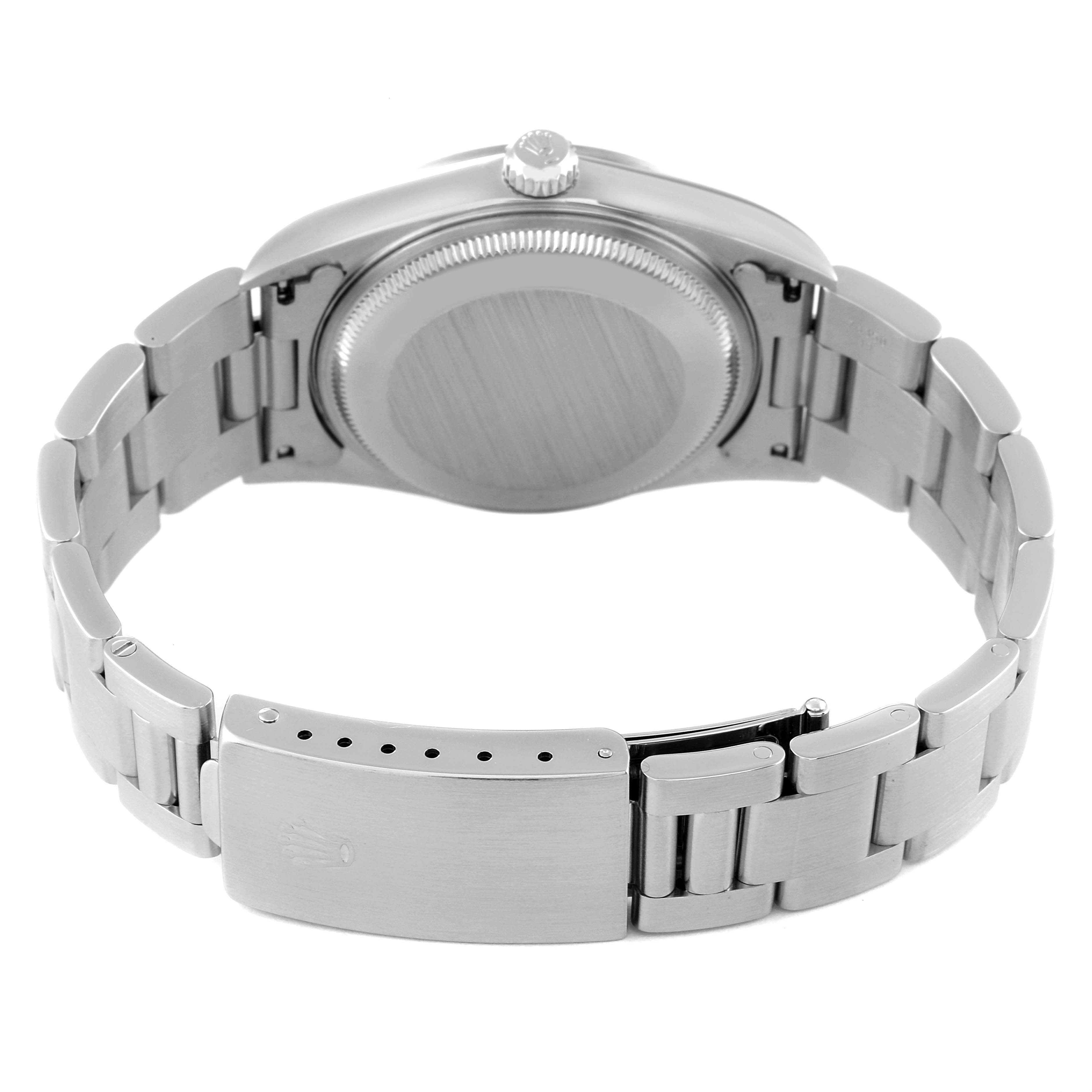 This image shows the back view of a Rolex Air-King 14000 Men's Stainless Steel Blue Dial 14000 Men's Stainless Steel Blue Dial watch, highlighting the case back and bracelet clasp.