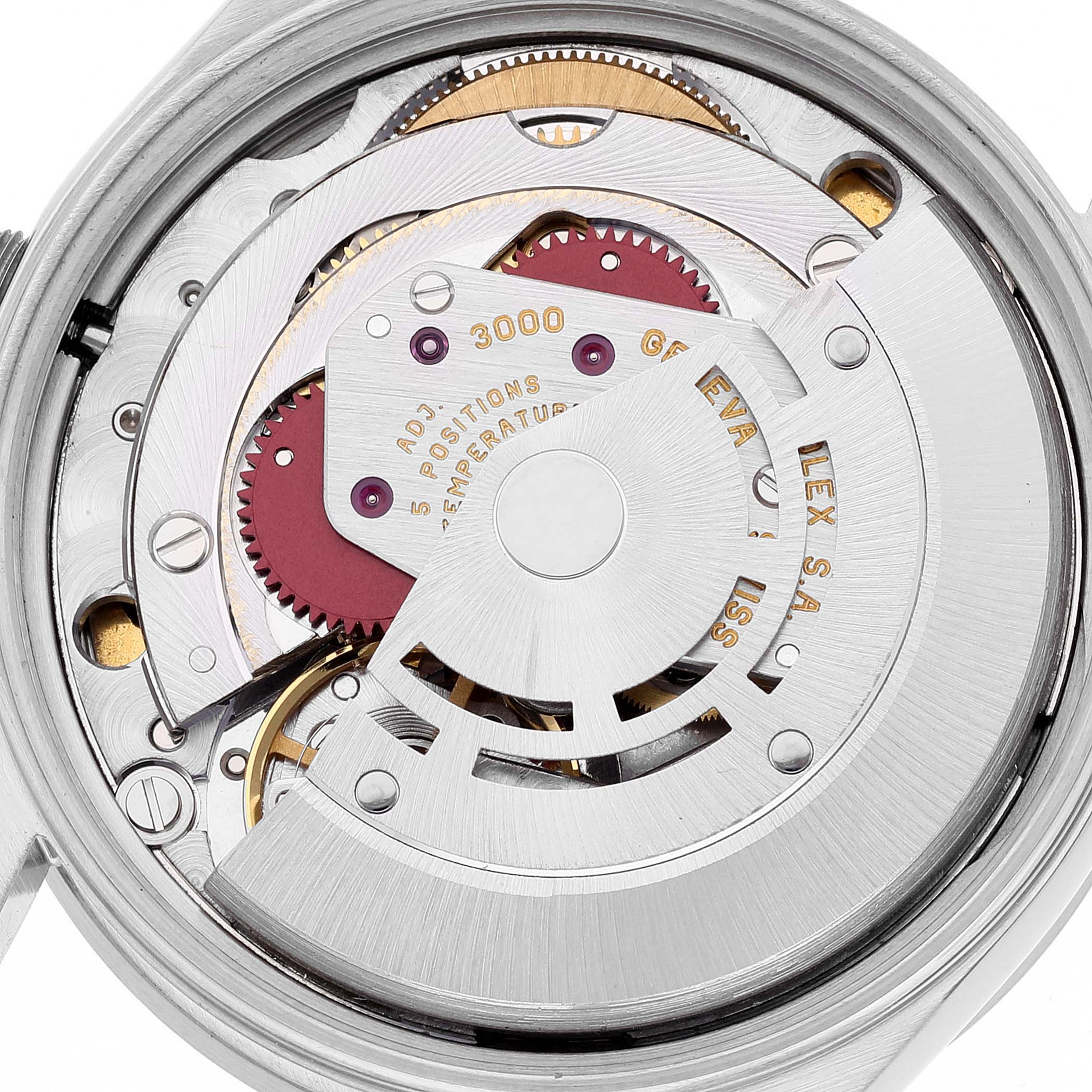 This image shows the intricate movement and internal mechanics of the Rolex Air-King 14010 Men's Stainless Steel White Dial 14010 Men's Stainless Steel White Dial watch from a close-up perspective.