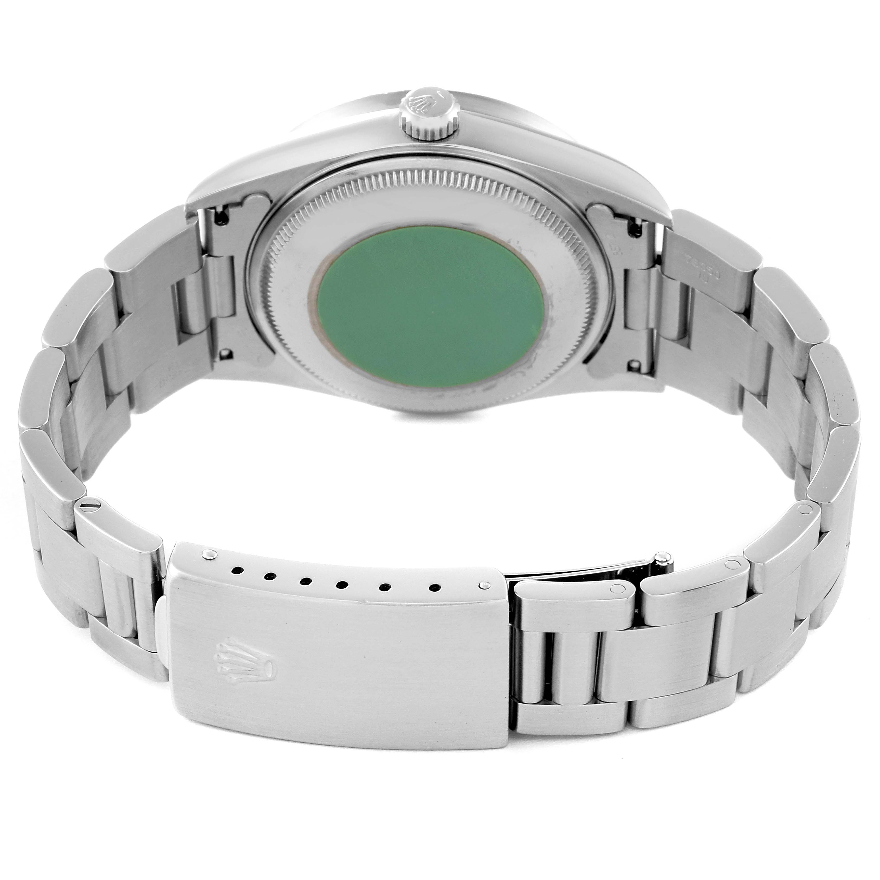 This image displays the back of a Rolex Air-King 14010 Men's Stainless Steel White Dial 14010 Men's Stainless Steel White Dial watch, focusing on the case back, crown, and bracelet clasp.