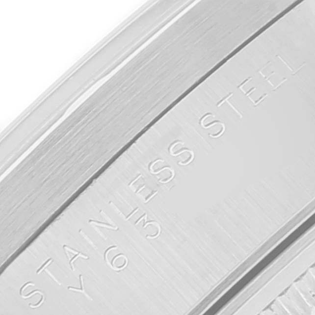 This image shows a close-up of the stainless steel casing of a Rolex Air-King 14010 Men's Stainless Steel Silver Dial 14010 Men's Stainless Steel Silver Dial watch.