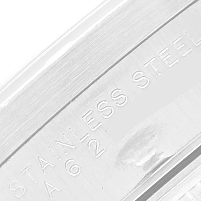 The image shows an angled close-up of the case back edge, including the "STAINLESS STEEL" engraving on a Rolex Air-King 14010 Men's Stainless Steel Silver Dial 14010 Men's Stainless Steel Silver Dial watch.