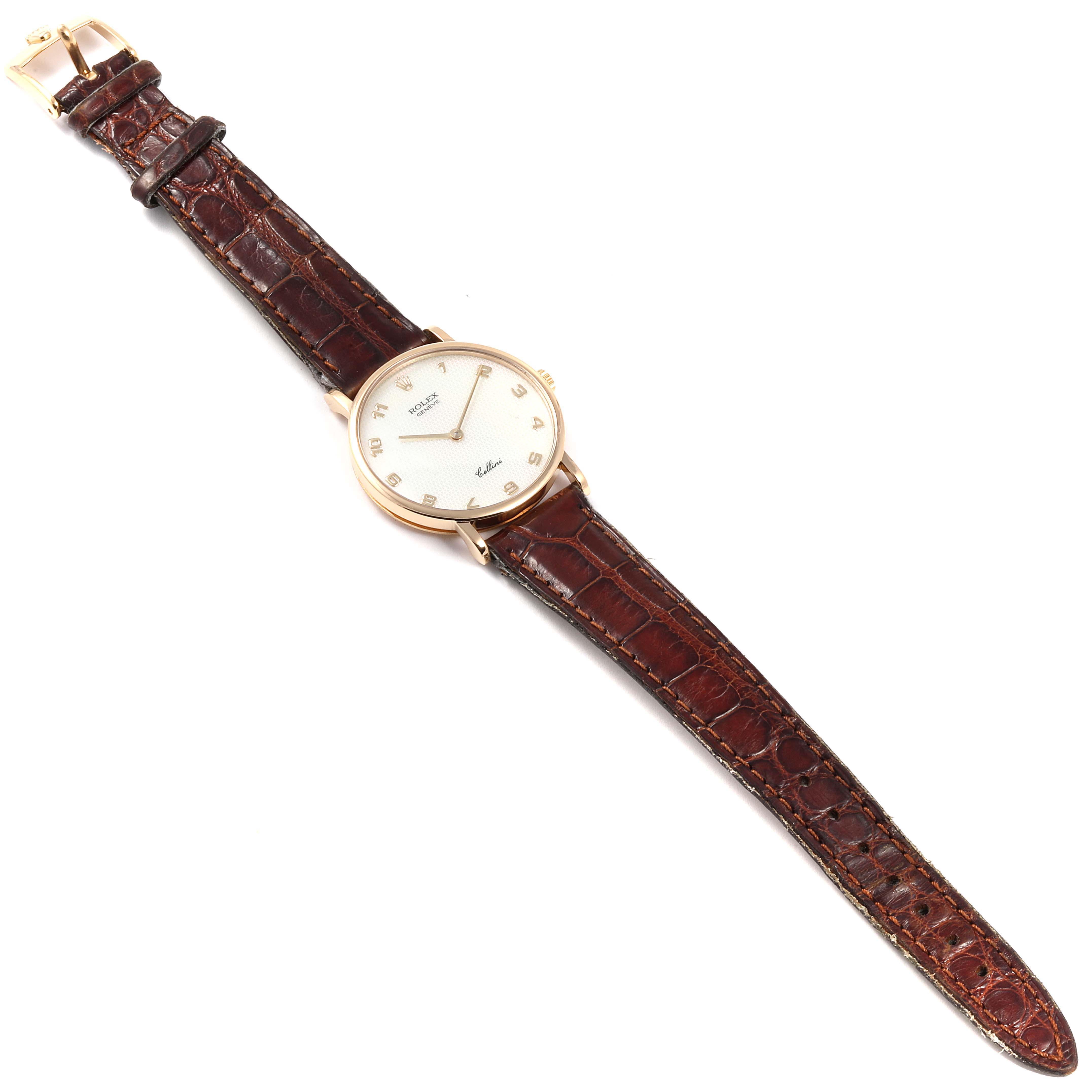 The image shows a Rolex Cellini 5112 Men's Yellow Gold Mother of Pearl Dial 5112 Men's Yellow Gold Mother of Pearl Dial watch with a brown leather strap and gold case, viewed from above displaying its entirety.