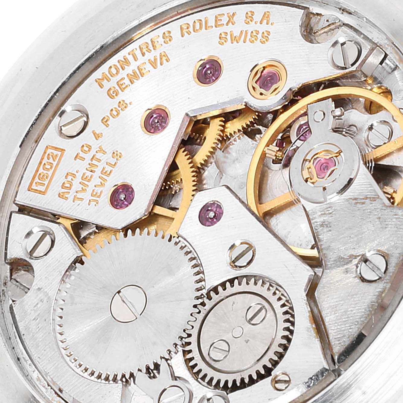 This image shows a close-up view of the internal movement mechanism of a Rolex Cellini 5112 Men's Yellow Gold Mother of Pearl Dial 5112 Men's Yellow Gold Mother of Pearl Dial watch.