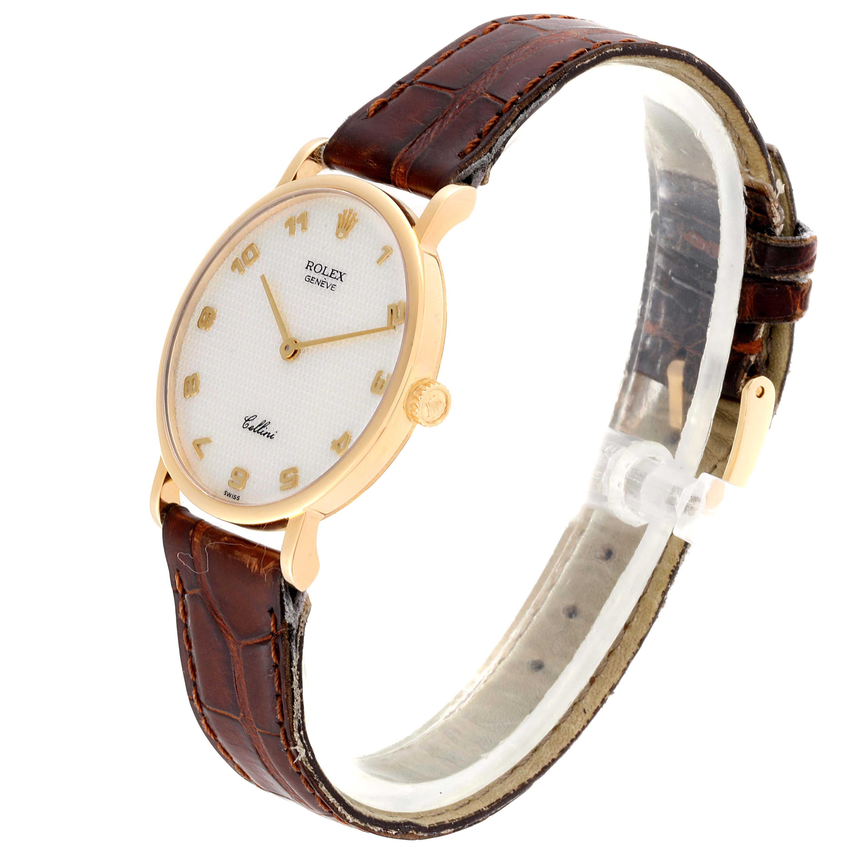 The Rolex Cellini 5112 Men's Yellow Gold Mother of Pearl Dial 5112 Men's Yellow Gold Mother of Pearl Dial watch is shown at a slight angle, highlighting its round face, gold case, leather strap, and crown.